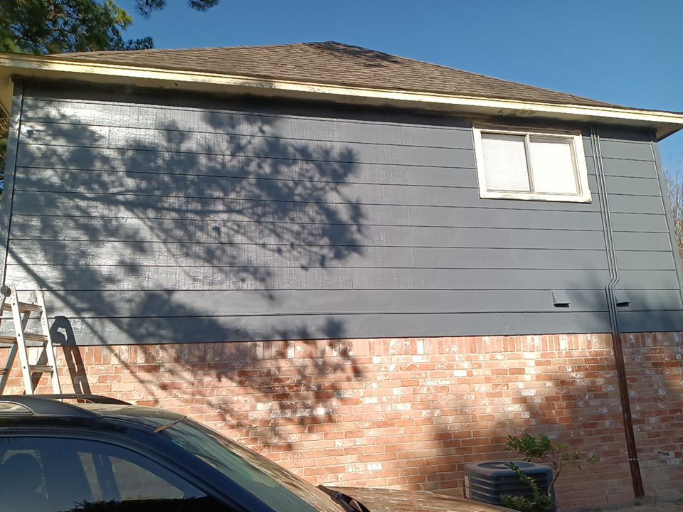 Interior and exterior painting project by Roof Concepts Construction