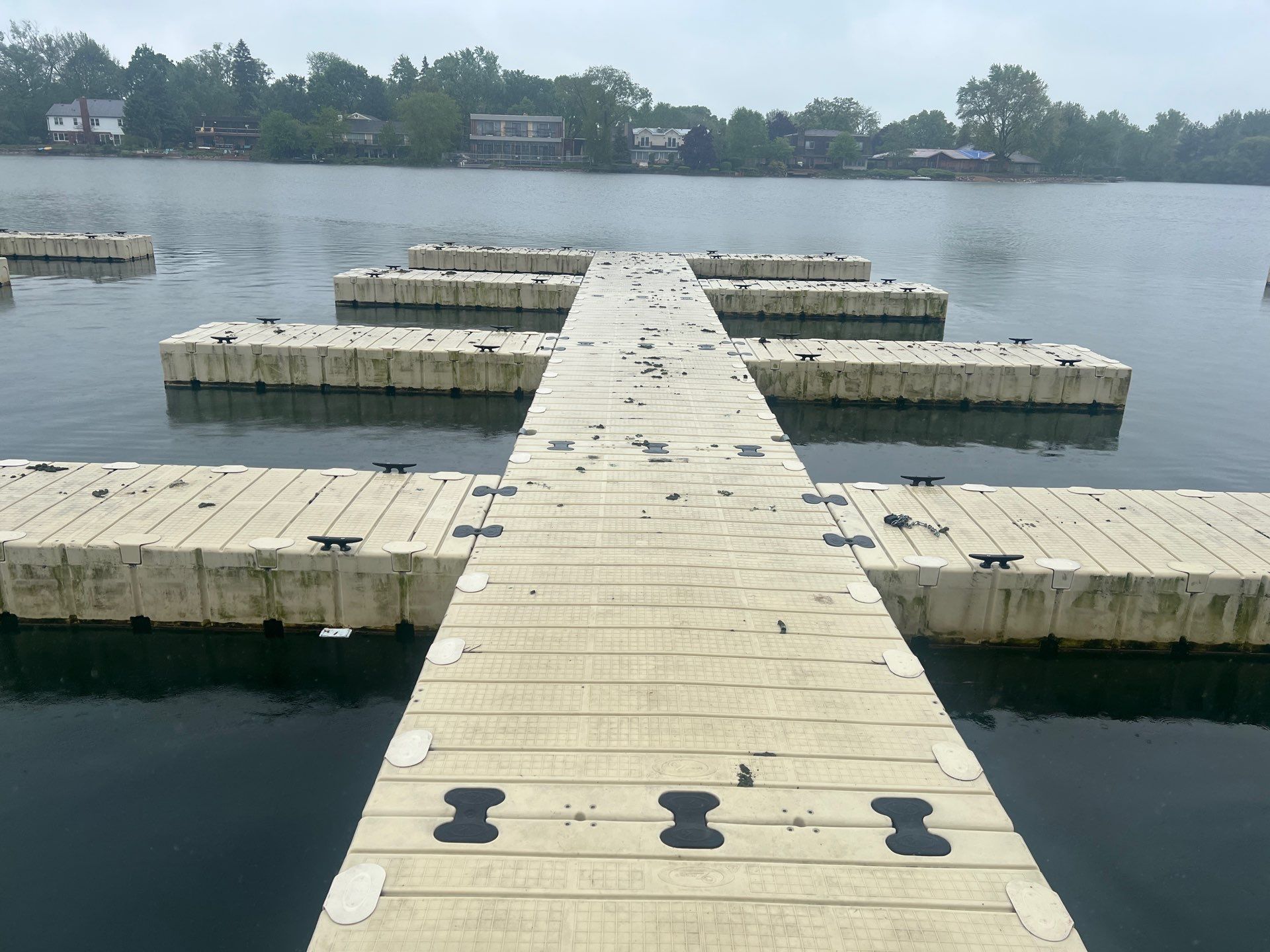 Power washing of floating dock by Northern Power Washing LLC.