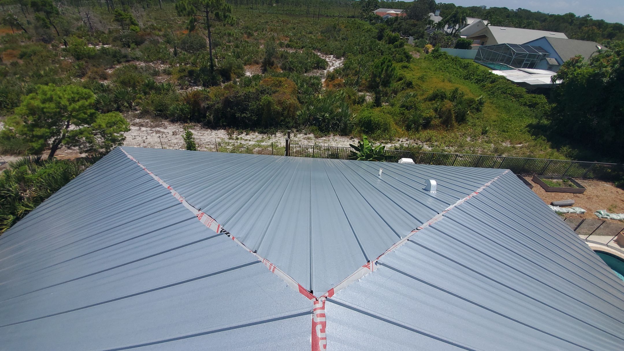 Standing Seam Metal Roof Replacement by Sailfish Roofing