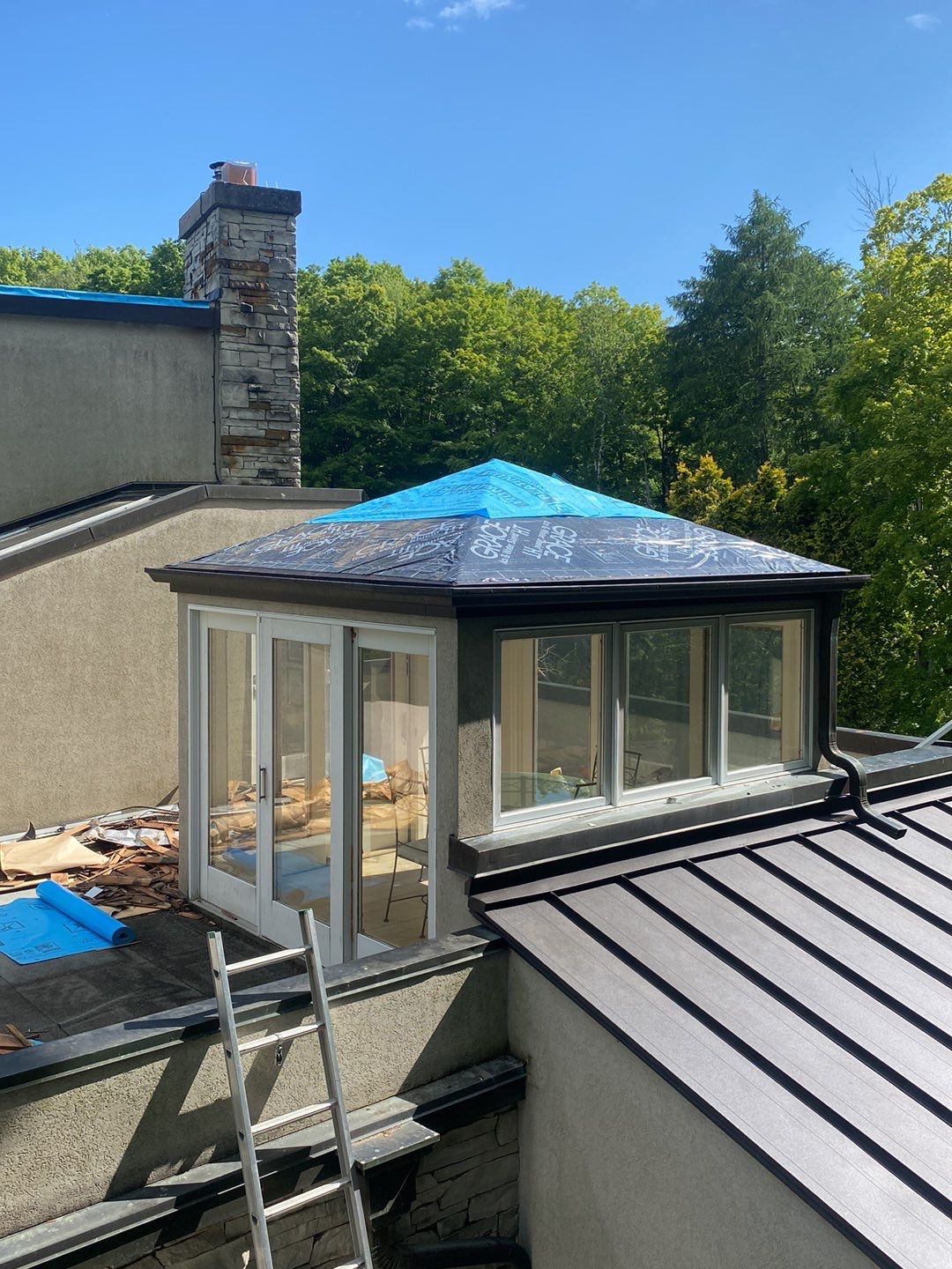 Roof Replacement using 16" Standing Seam Panels by Jay Carter Roofing & Sheet Metal