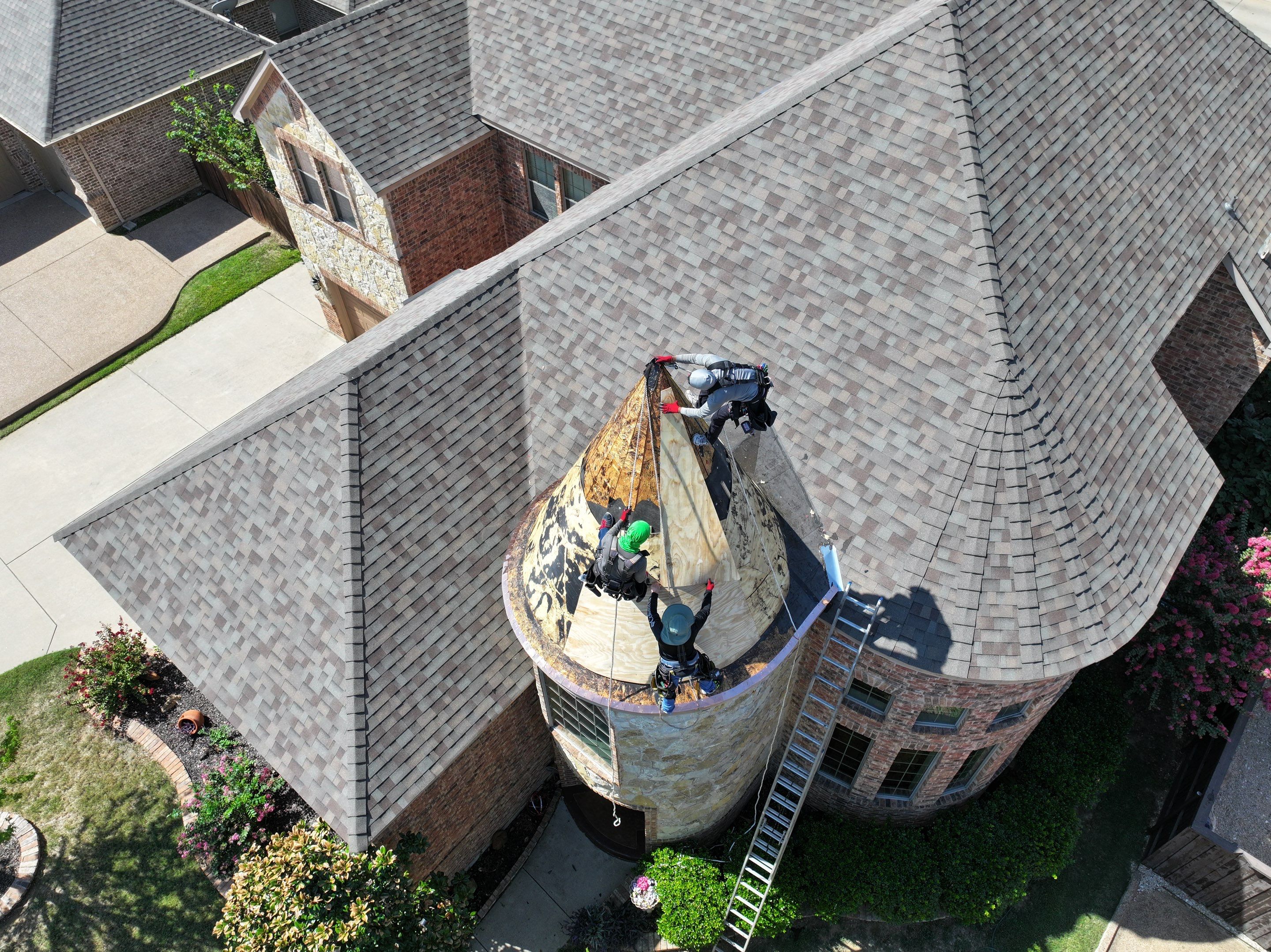 Installing Custom copper turret and Malarkey Vista Class 4 shingles Hail Damage Upgrade by Becker Roofing and Exteriors