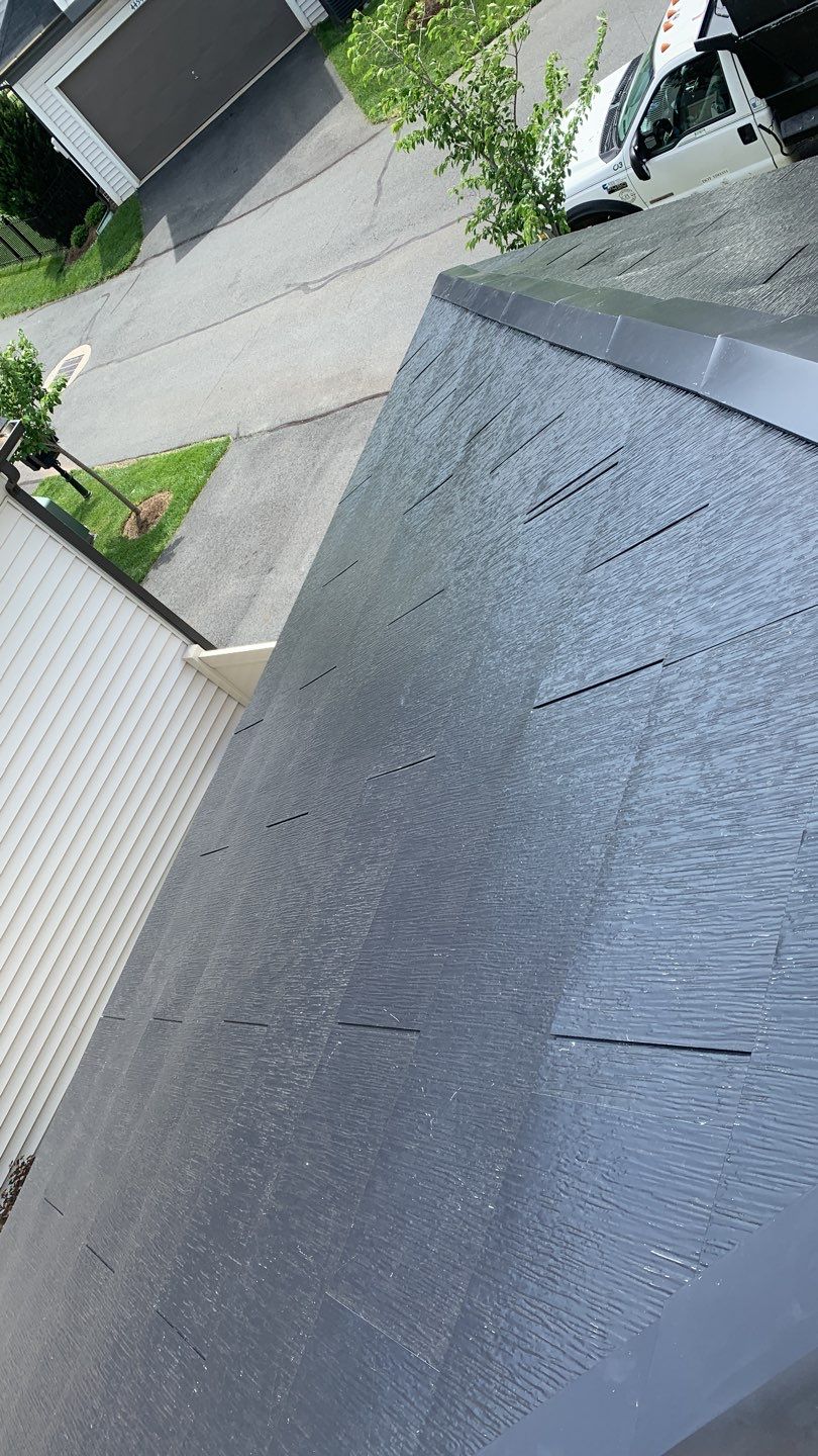 Tesla Solar Roof using Tesla Solar Roof V3 tiles by American Home Contractors