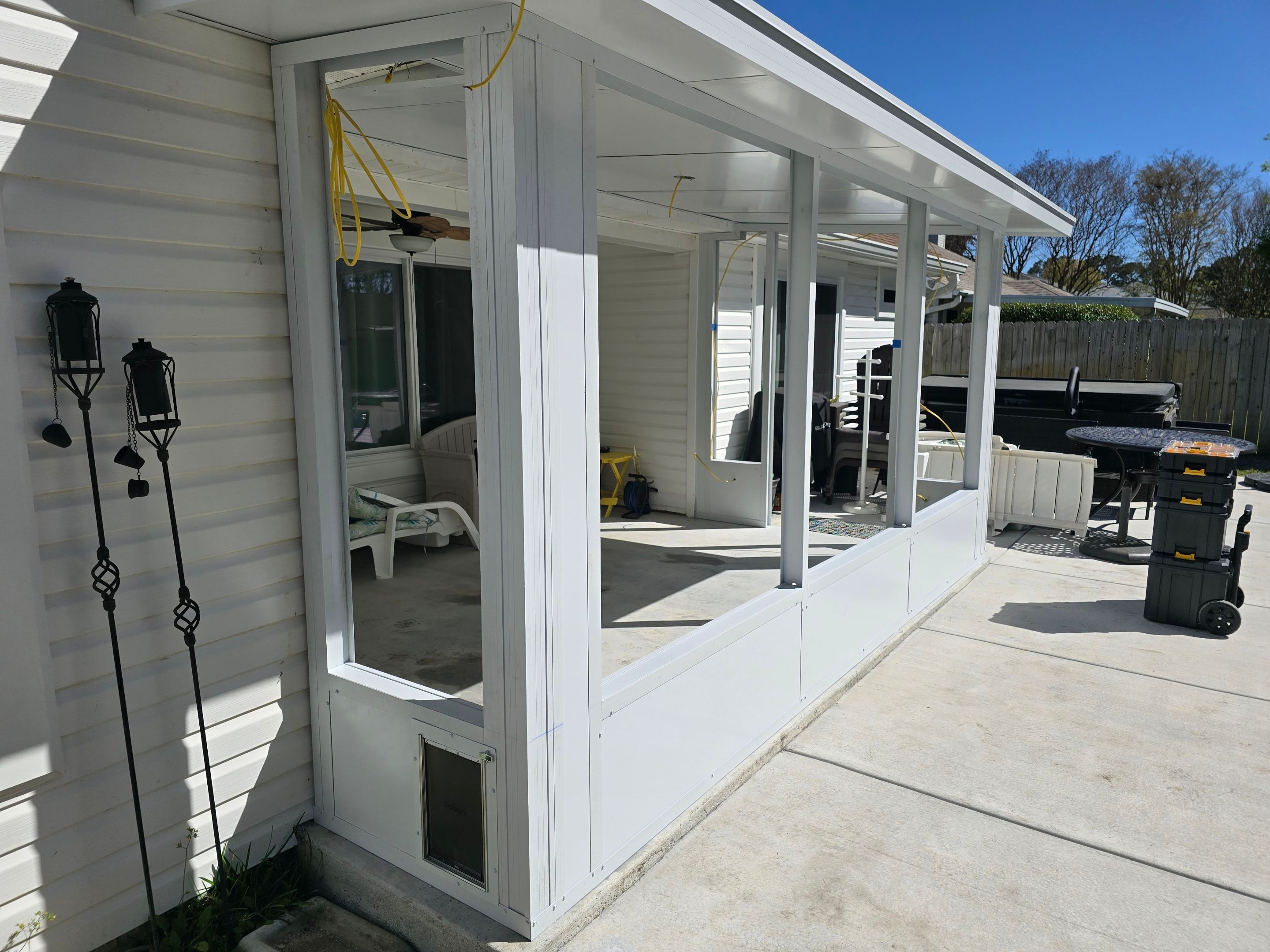 Poolside Glass Room in Gulf Breeze by Titan Sunrooms