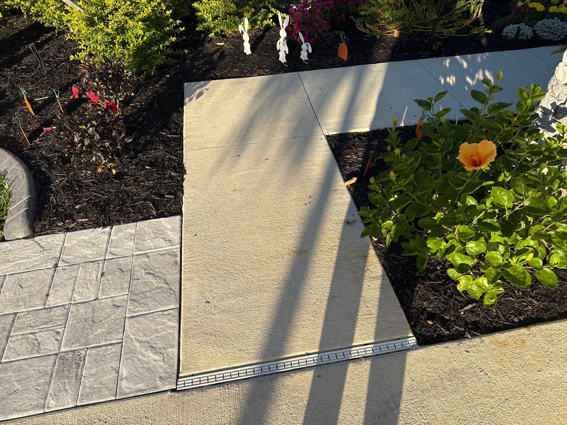 Rust Stain Removal from Concrete Driveway and Pavers in Park East at Azario | Lakewood Ranch, FL by Sunshine AquaWash