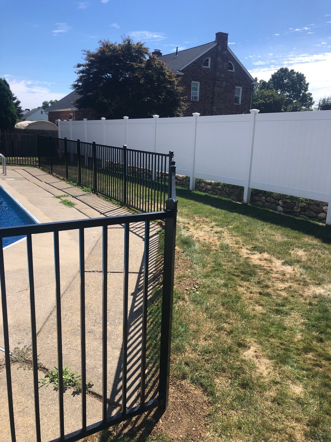 Black Aluminum Pool Fence by DiGiorgi Roofing and Siding Inc