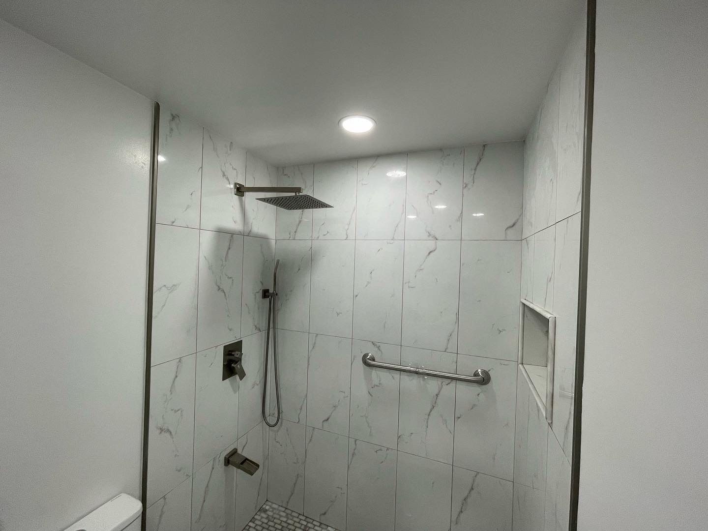 Bathroom Remodel using Tile by Home Concepts Construction