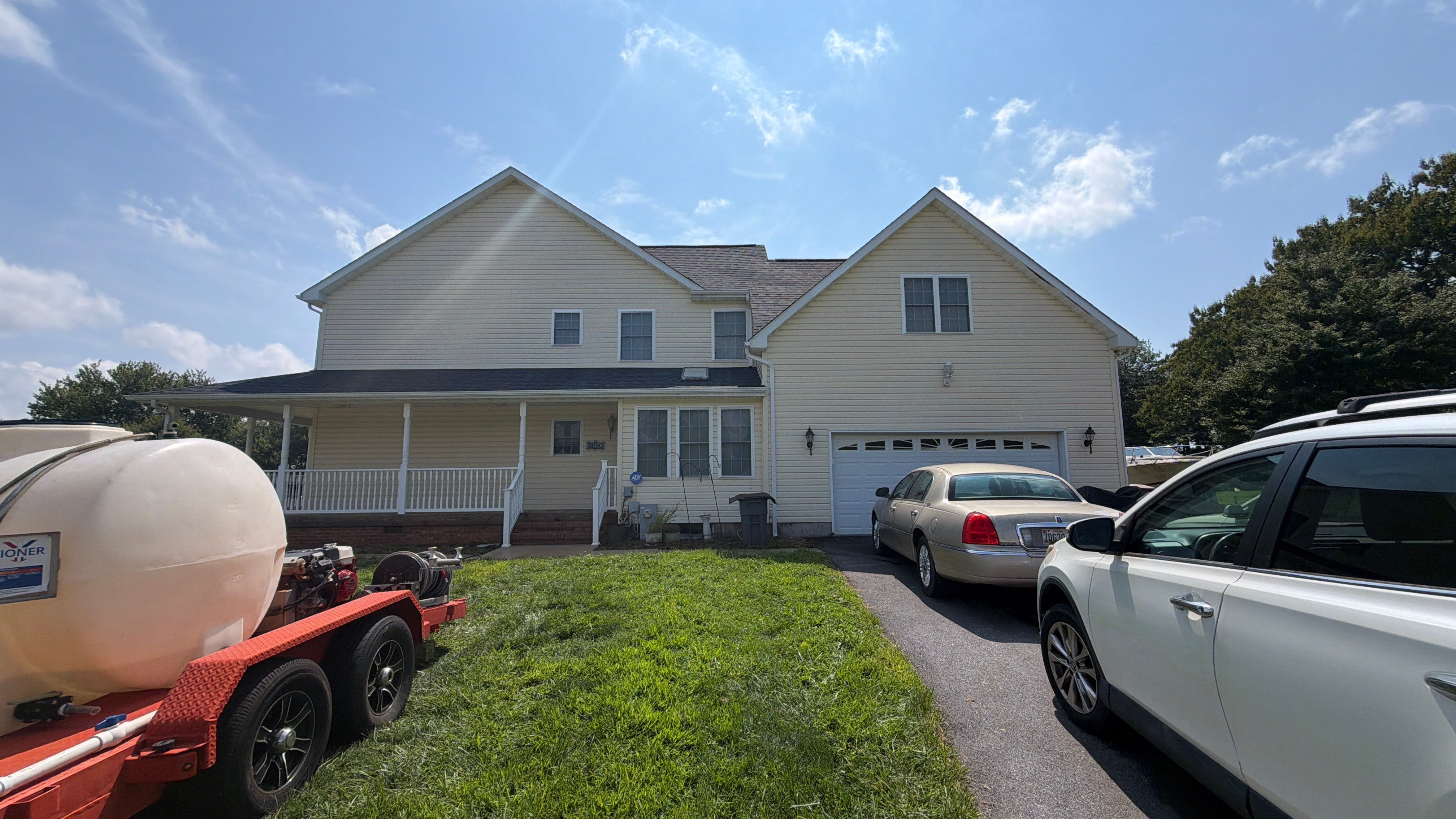 Vinyl Siding House Washing and Wood Deck Restoration in Carroll County by Baltimore Pressure Washers Inc.