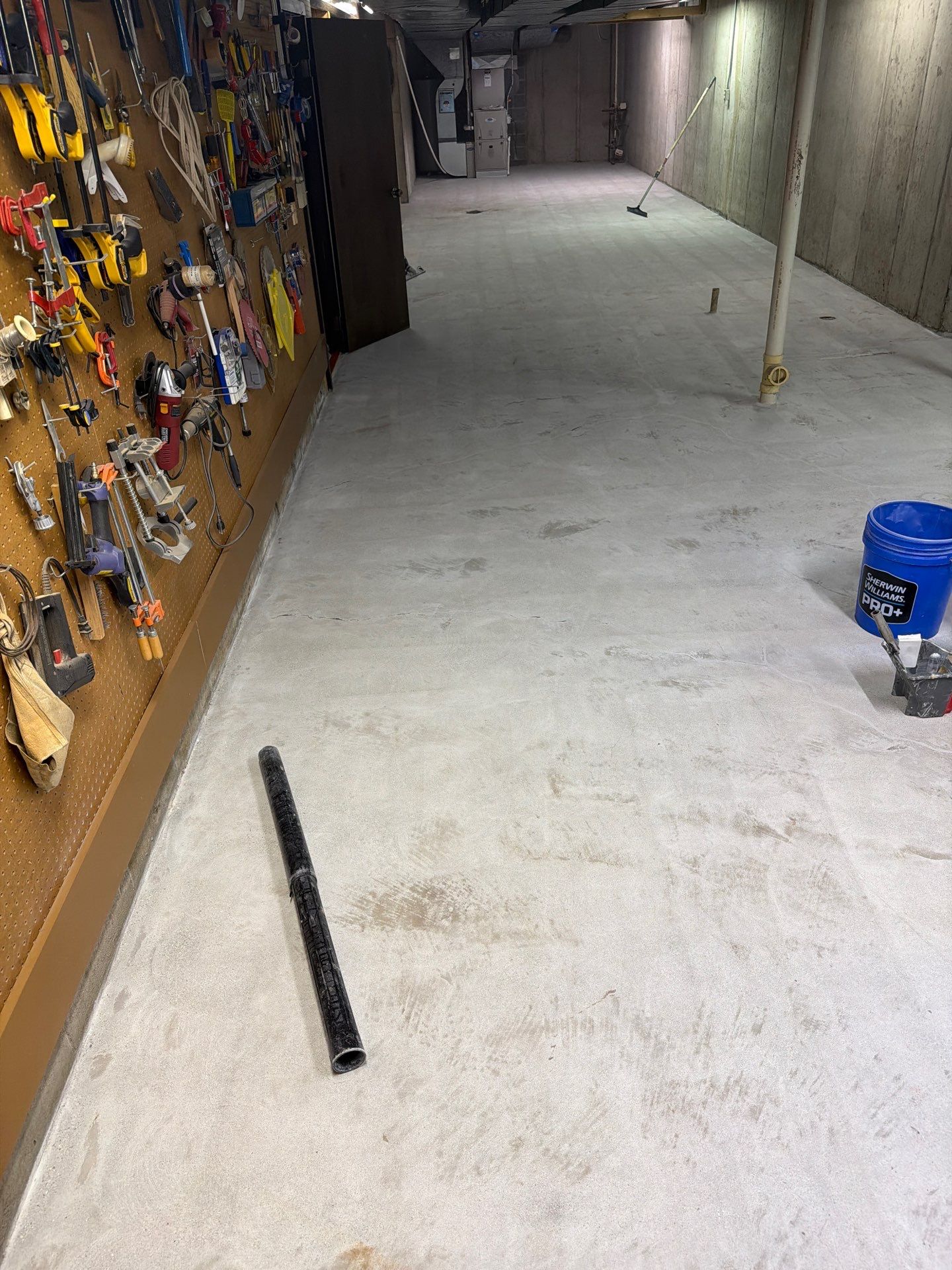 Full Basement and Garage Epoxy Flake Floor Installation in North Muskegon by Gordon Painting