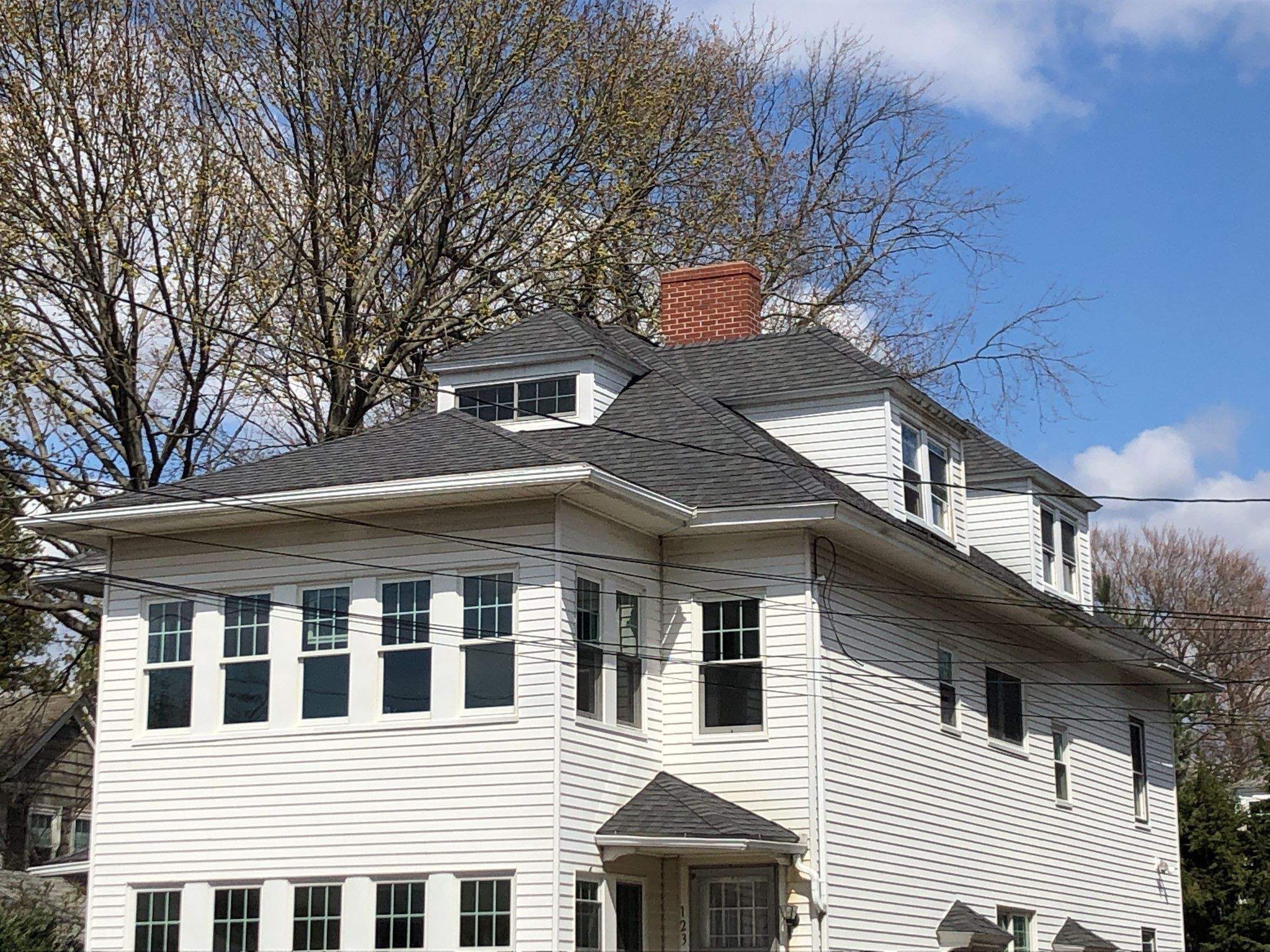 Pewterwood Roofs by Pinnacle Roofing & Skylights
