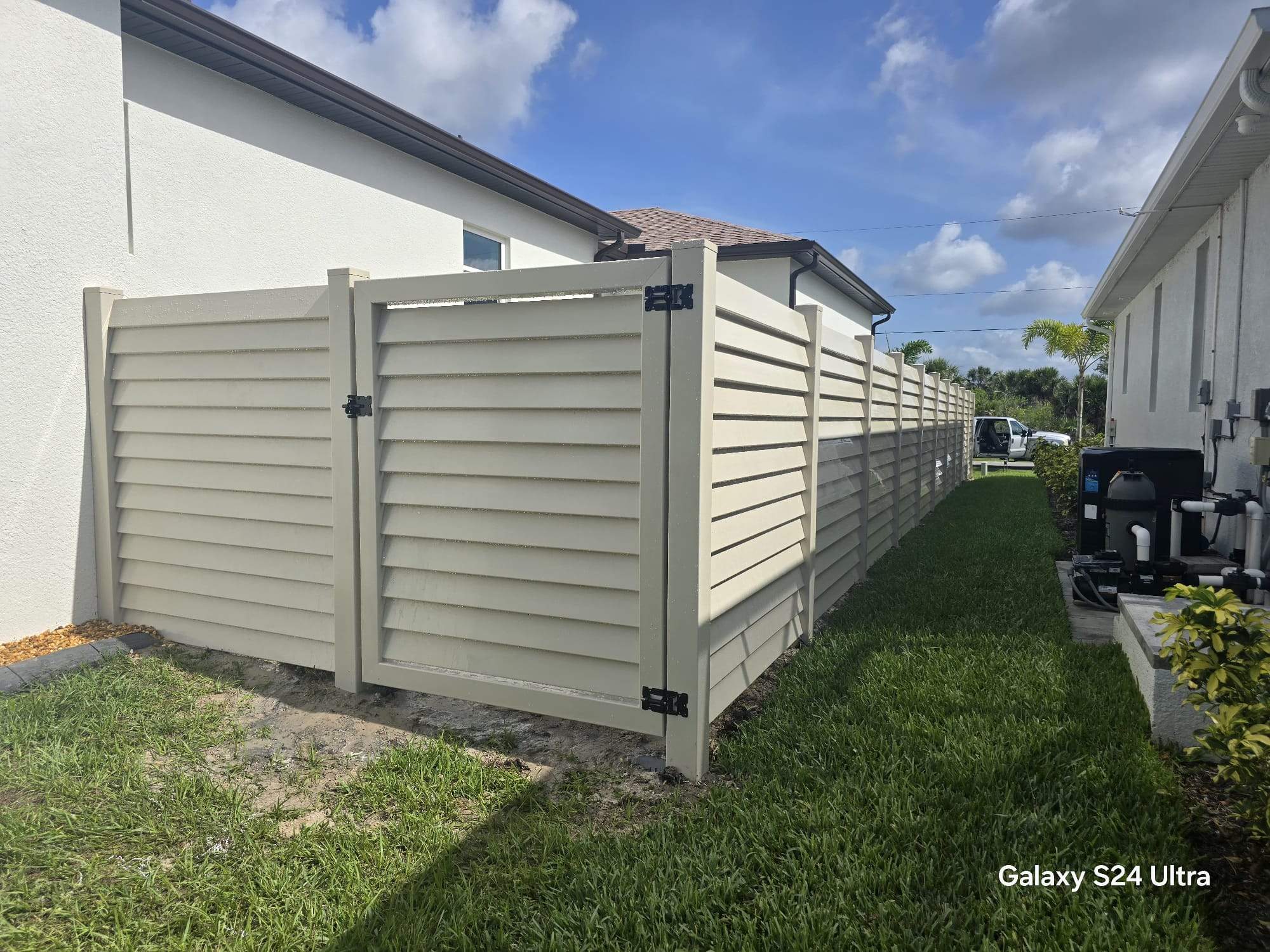 Tan Louvered Vinyl in Port Charlotte by True Fence LLC