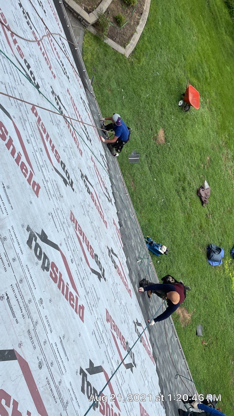 Roof Replacement using IKO Dynasty by American Home Contractors