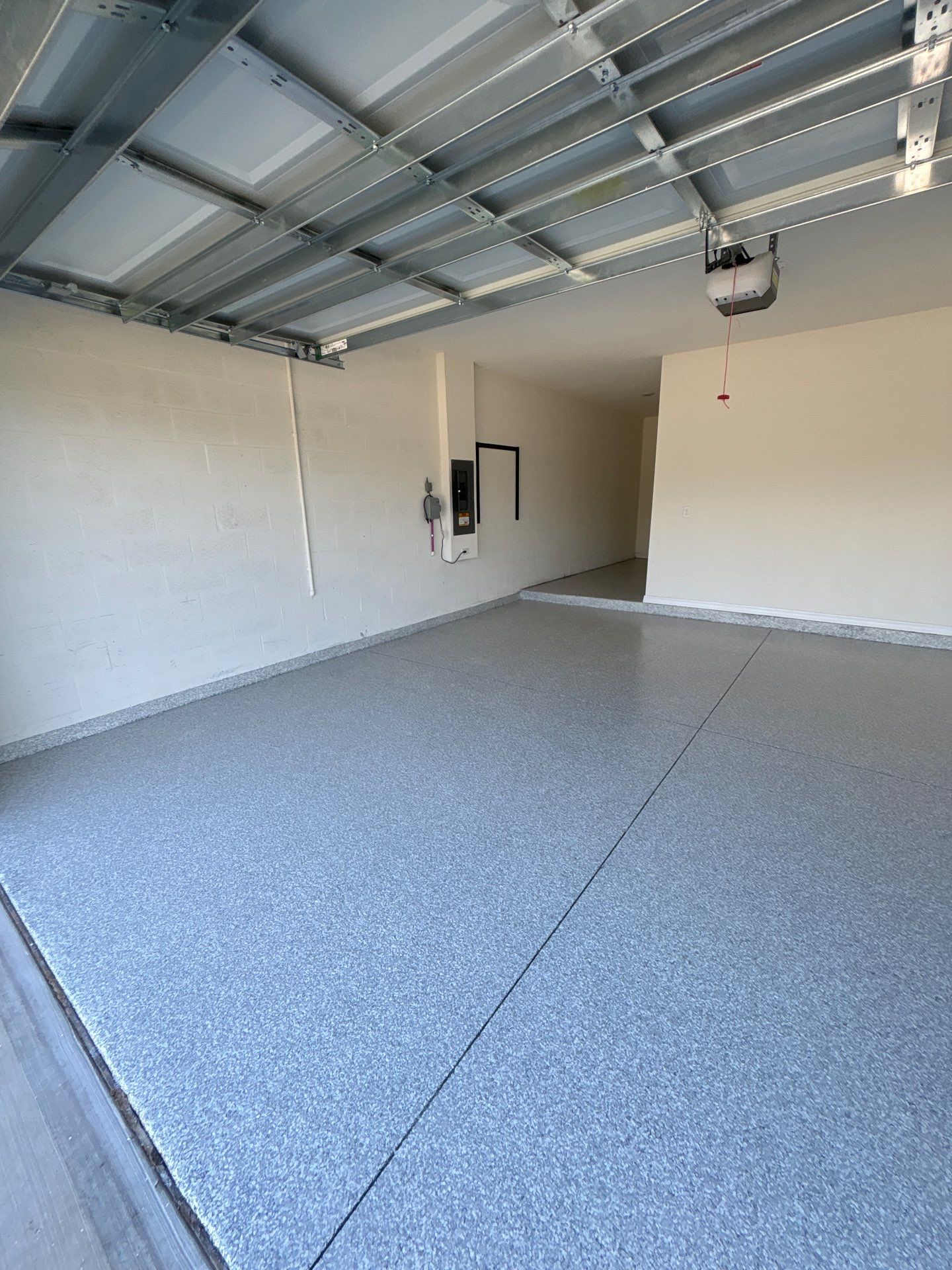 Flake Epoxy Garage Floor Coating System in Zephyrhills by Performance Floors & Coating
