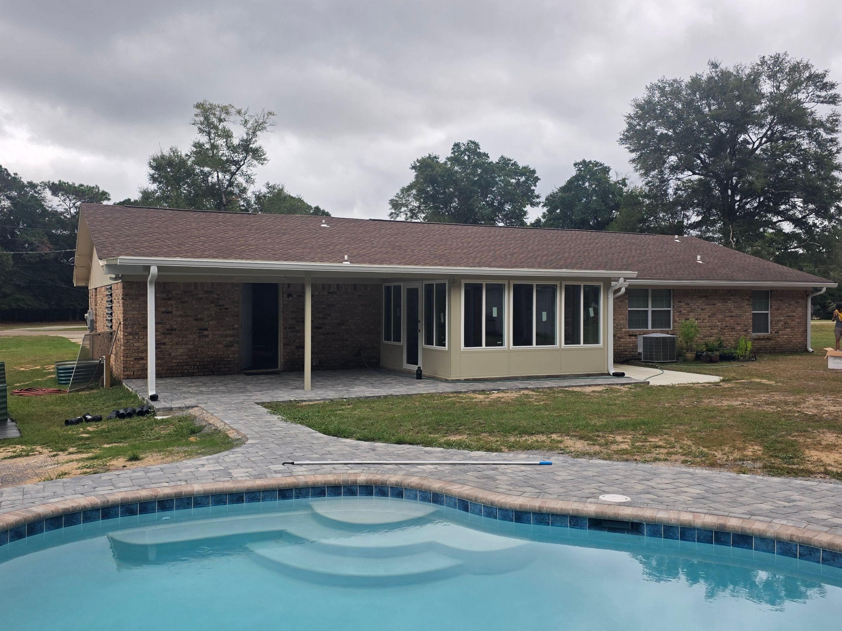 Sunroom Addition and Covered Patio by Titan Sunrooms