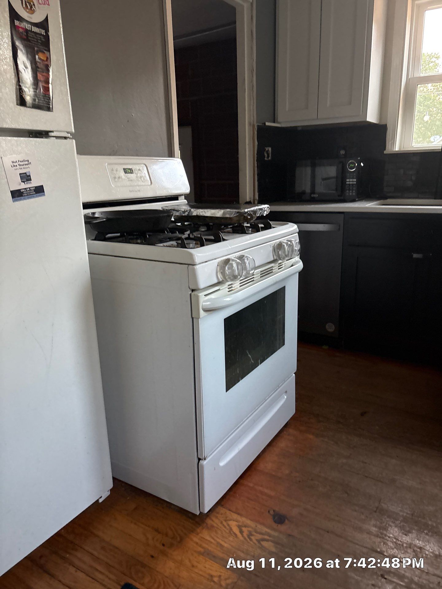 Two-Tone Kitchen Remodel with Black Subway Tile in Lincoln by CompanyCam Sales Demo