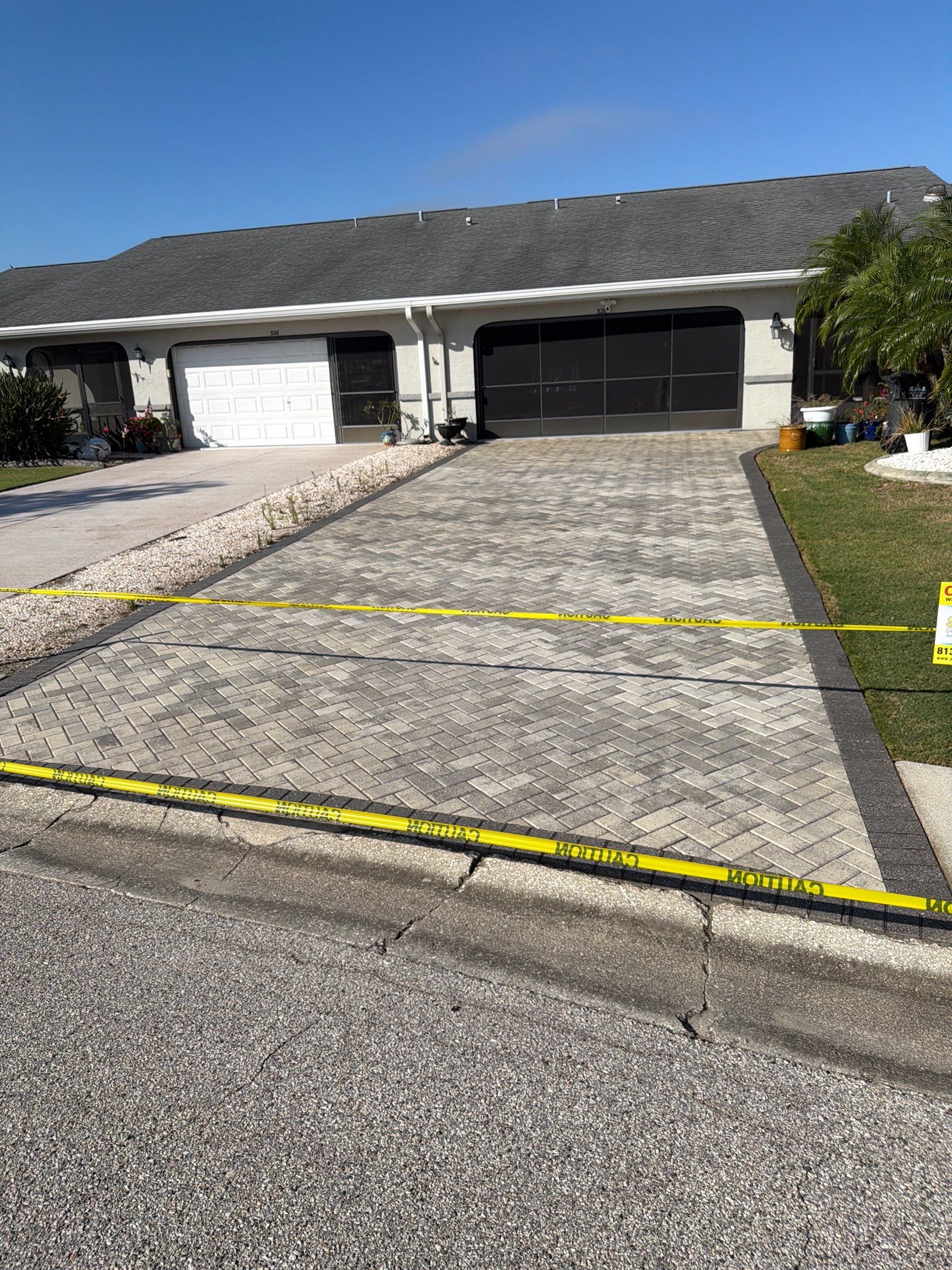 Paver Sealing and Cleaning for Herringbone Driveway in Sun City Center by Supreme Paver Experts
