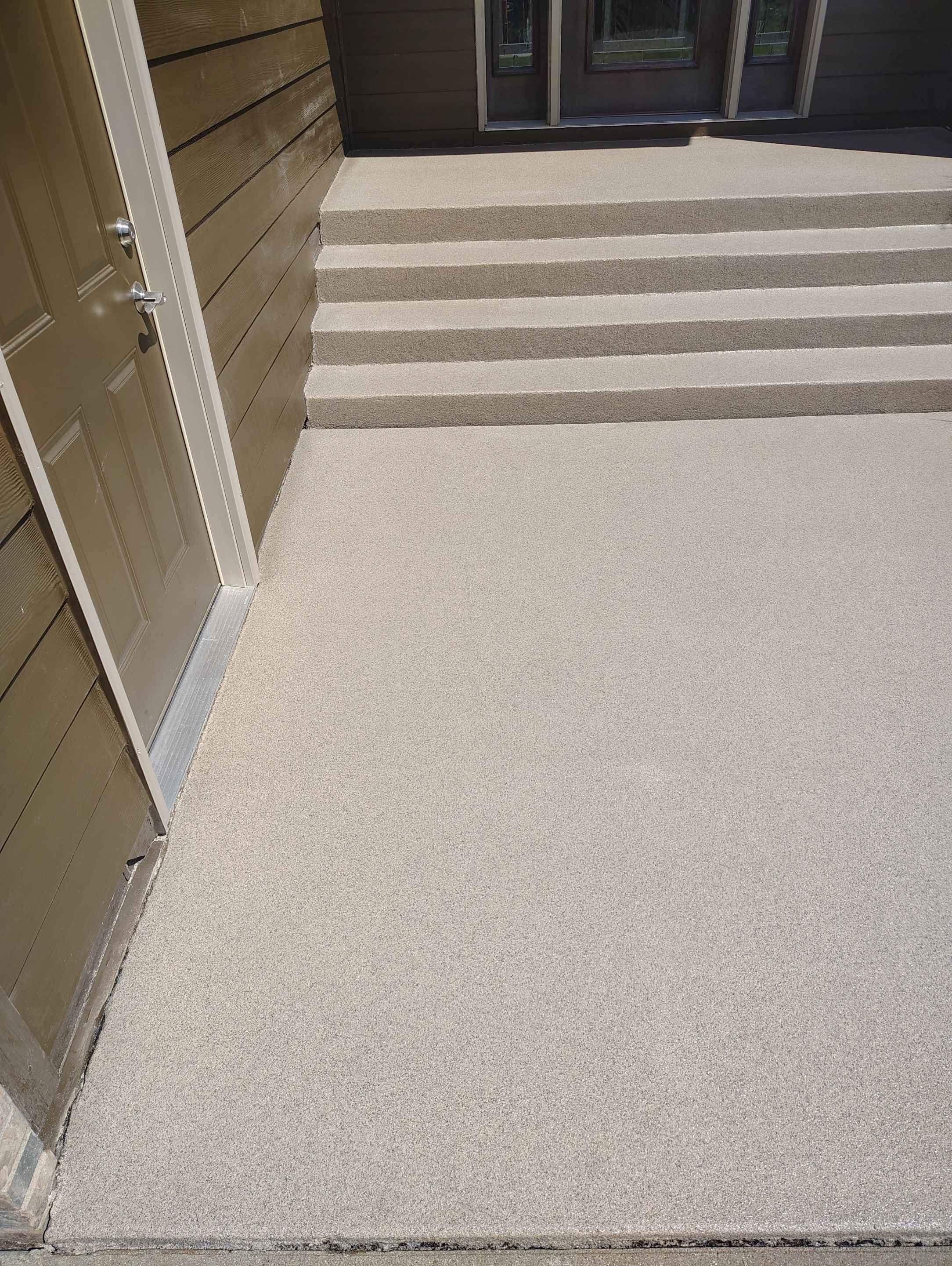 Textured Concrete Coating and Entryway Restoration in Madison by Select Painting, Coatings & Garage Cabinets