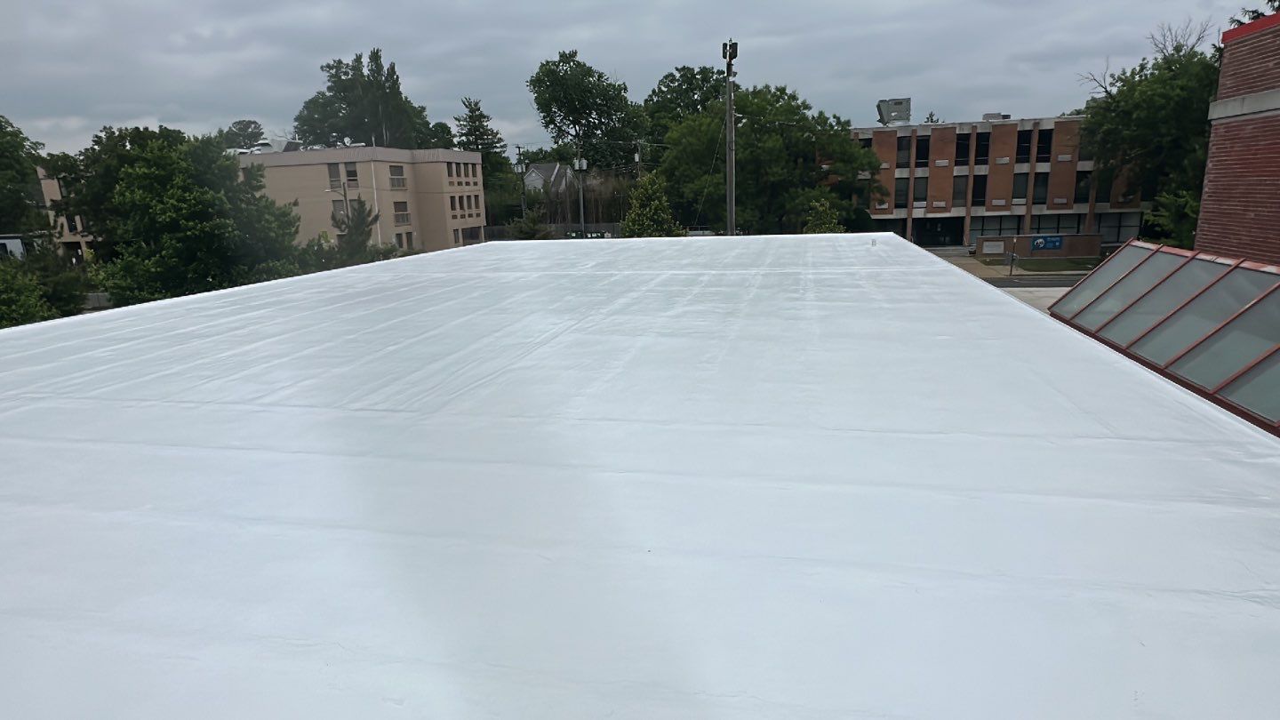 Roof Installation using Silicone TPO by ExteriorPros