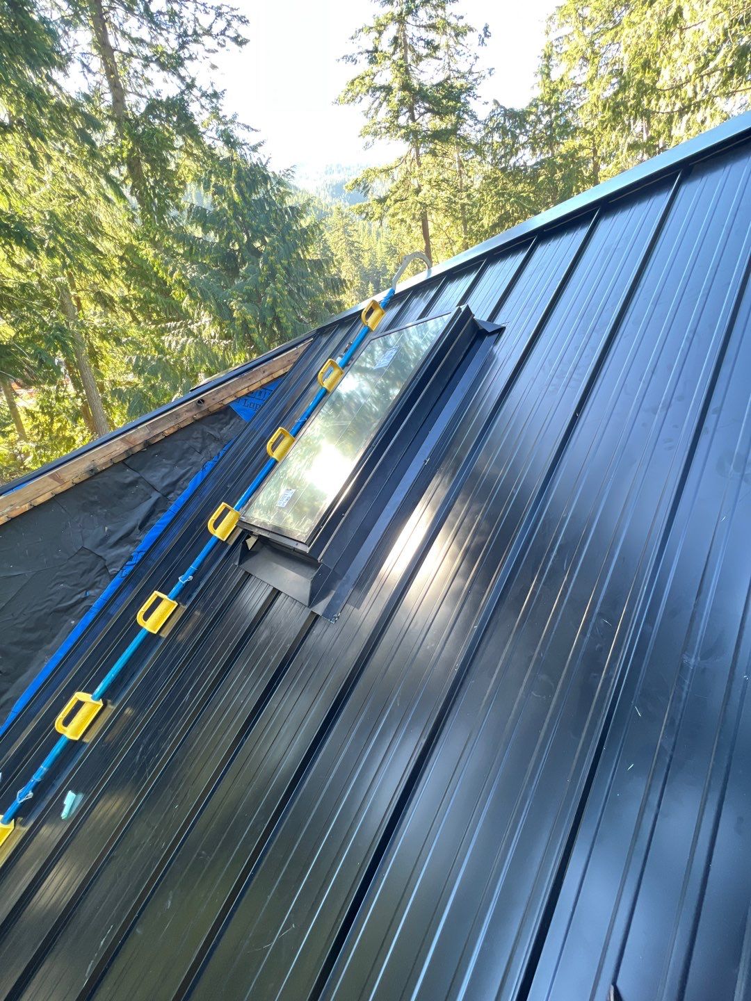 Residential ReRoofing Installation using 12" Prolok metal  by Top Notch Roofing Inc