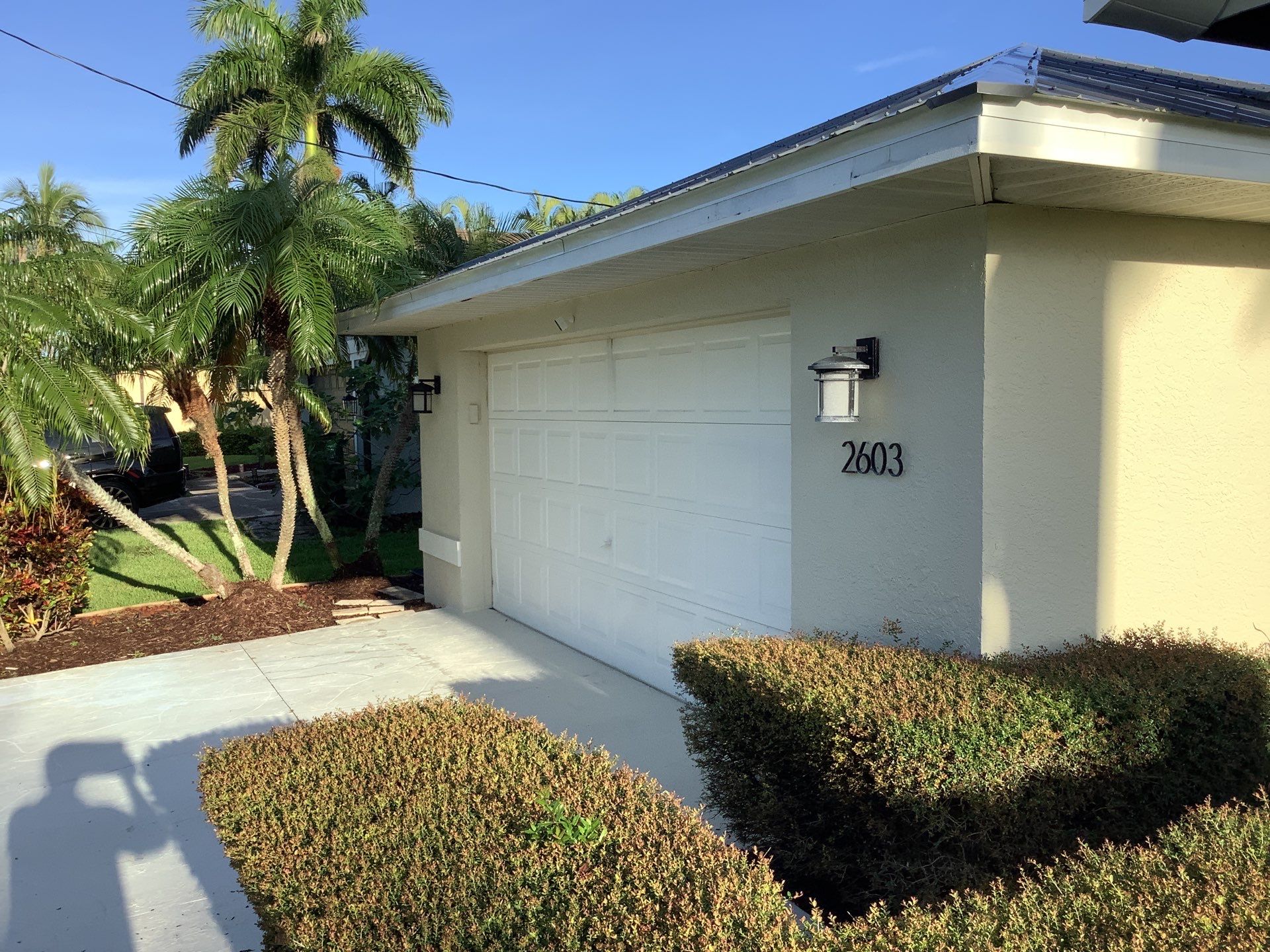 Downspout Installation using 3X4 Elbow Downspout in Cape Coral by Gutter Professors