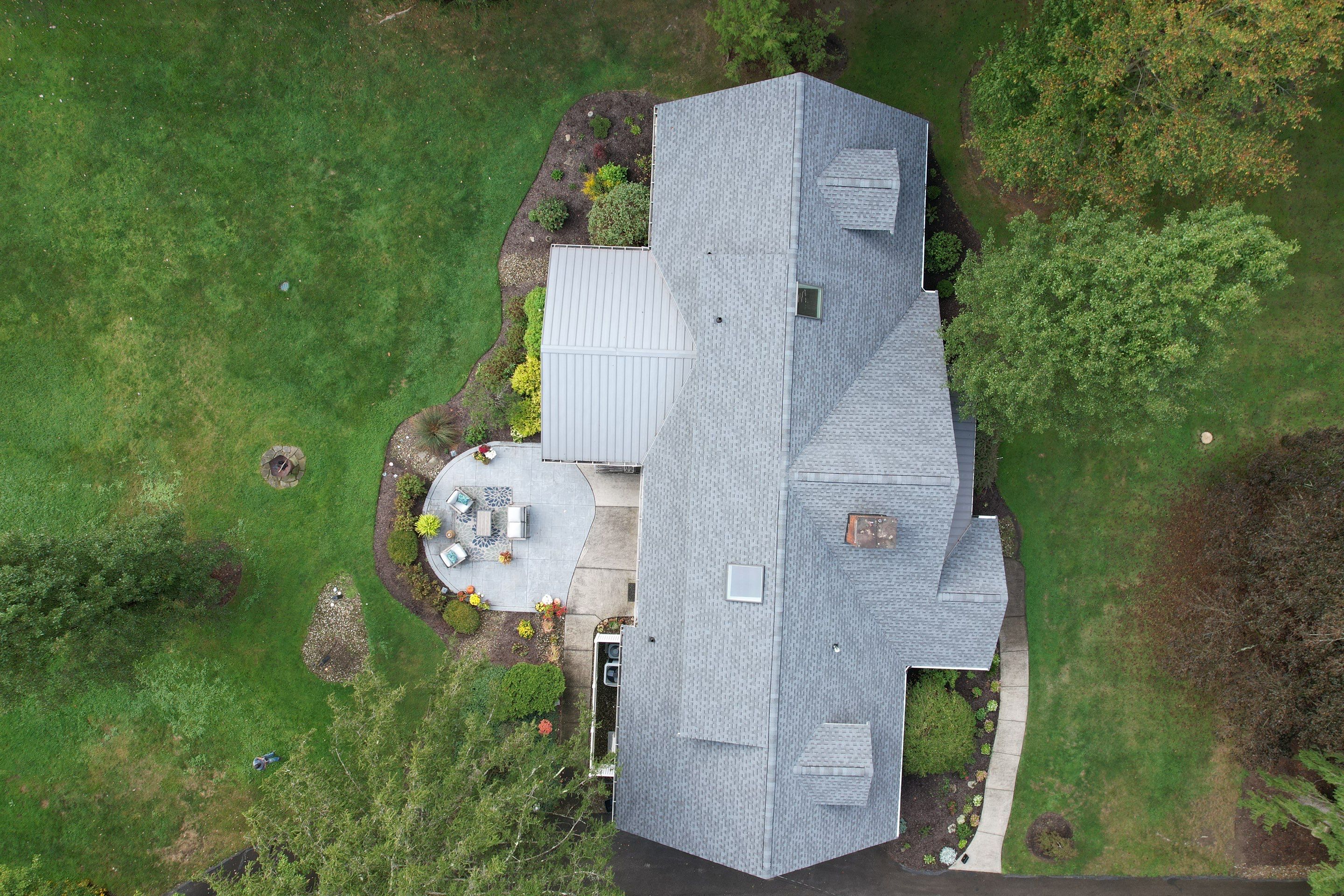 Moreland Hills Roof + Gutters Replacement by Atlas Roofing & Restoration