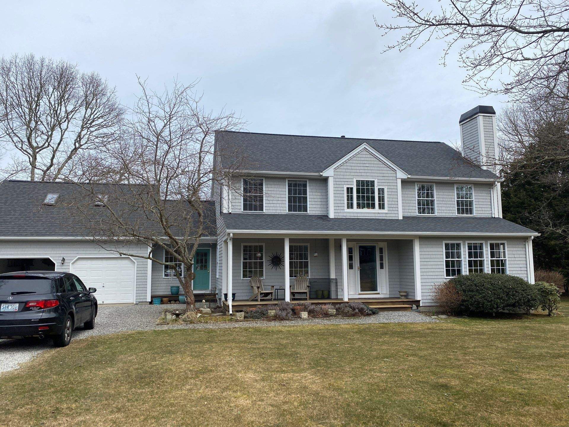 Pewterwood Roofs by Pinnacle Roofing & Skylights
