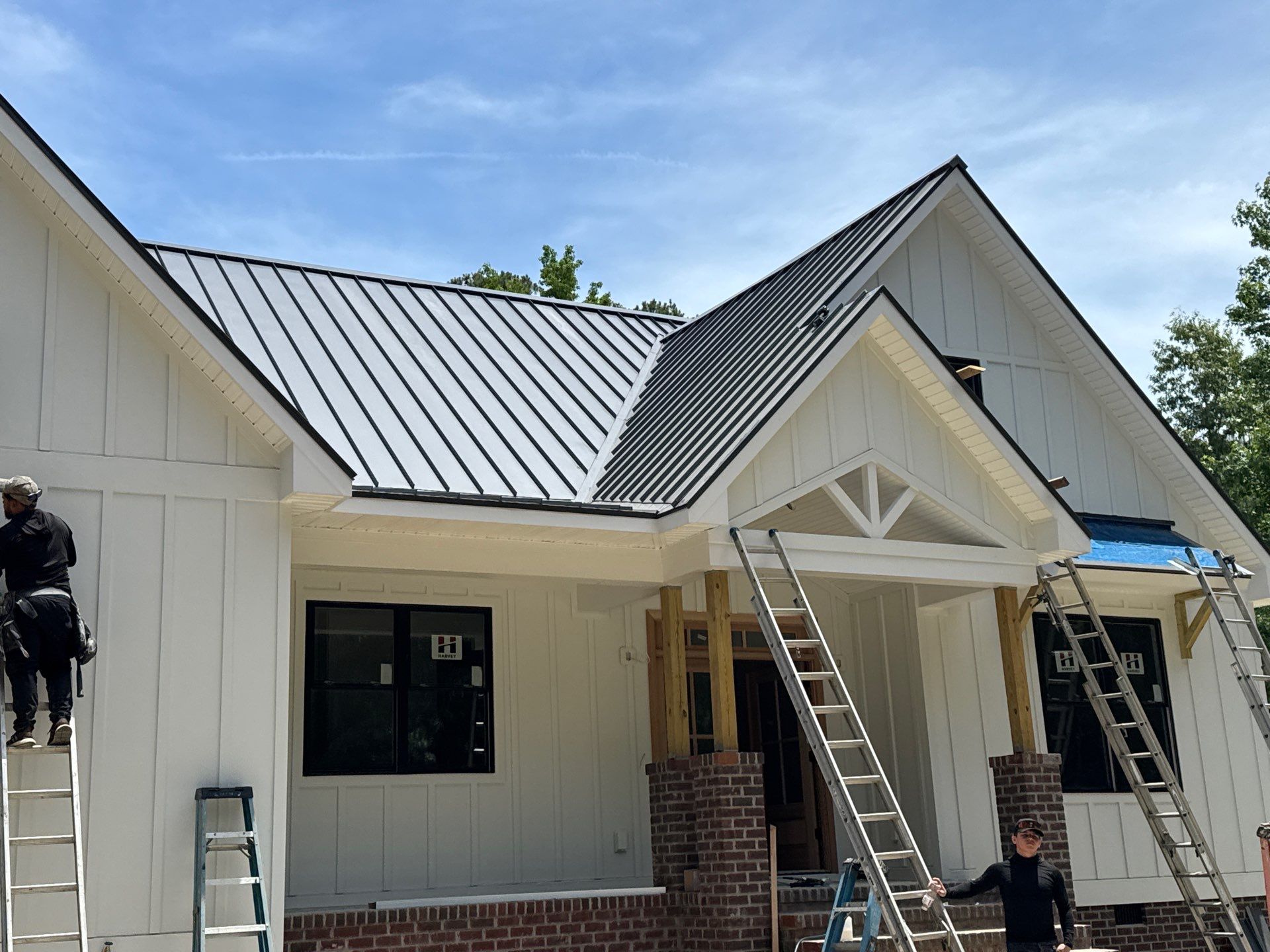 Custom New Construction Home Featuring Standing Seam Metal Roofing in Port Haywood by Cade Construction