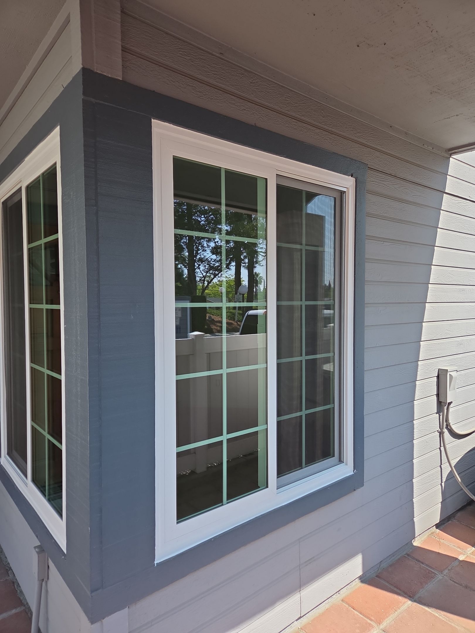 Window Installation using Milgard V300 Trinsic with grids by American Window Company
