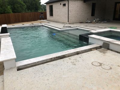 Geometric Pool with Raised Spa