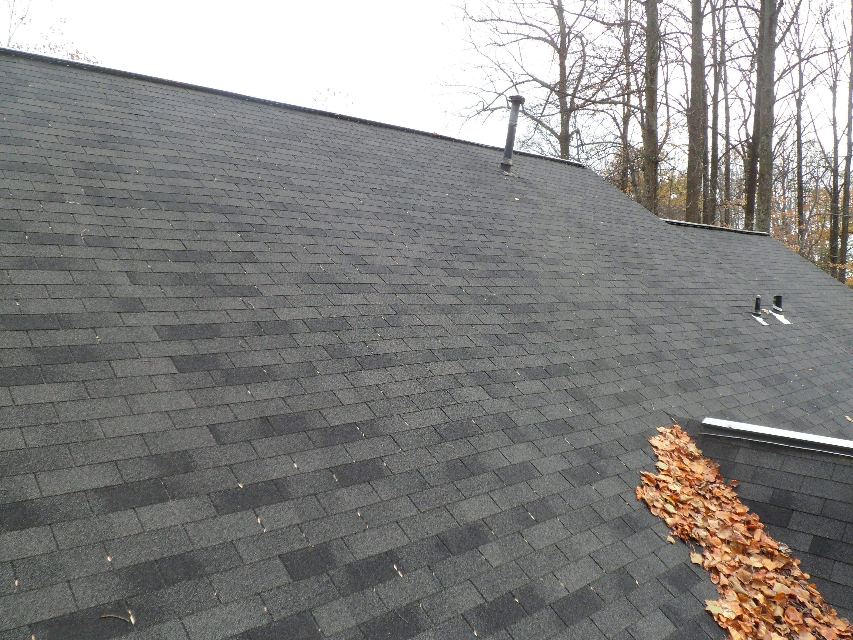 Residential Roofing Installation using Charcoal Black by Alpha Design Services