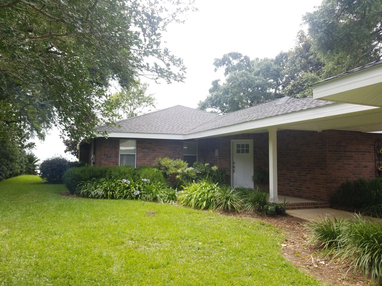 Residential Roofing Installation using Roof Replacement by American Roofing & Construction LLC
