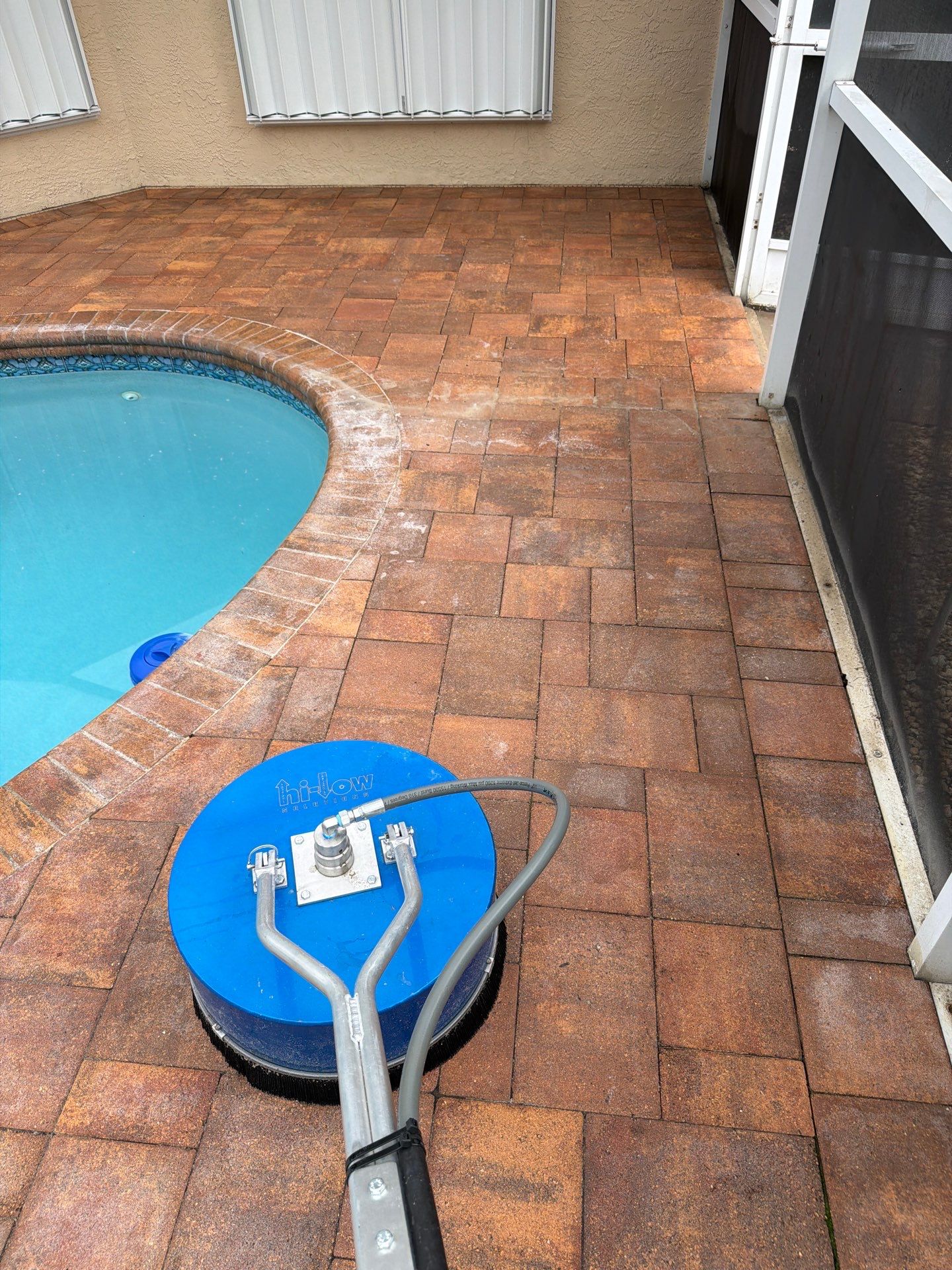 Paver Sealing and Striping for Sun City Center Pool Deck by Supreme Paver Experts