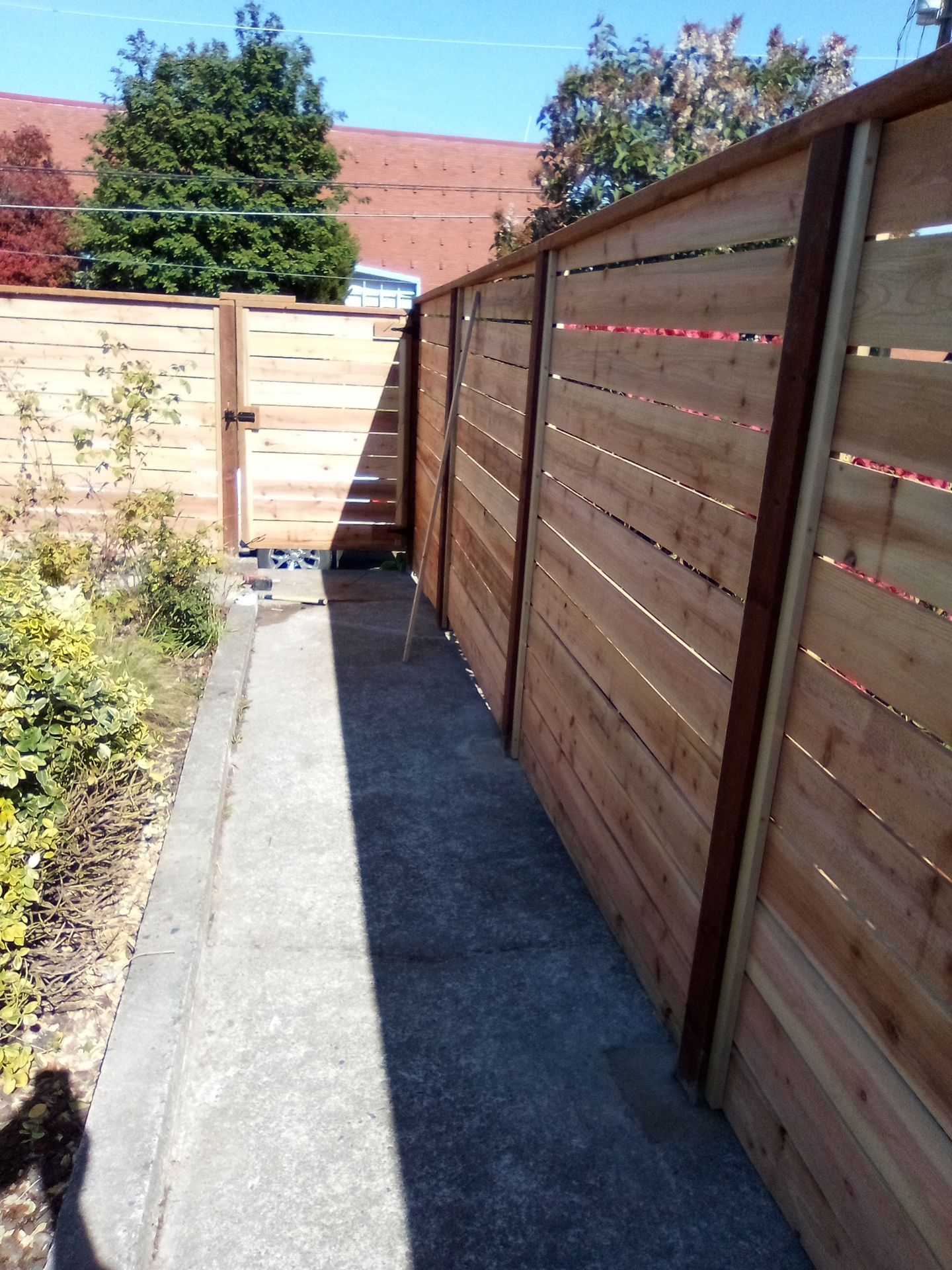 Retaining Wall & Fence Installation  by Jireh Asphalt & Concrete Inc 