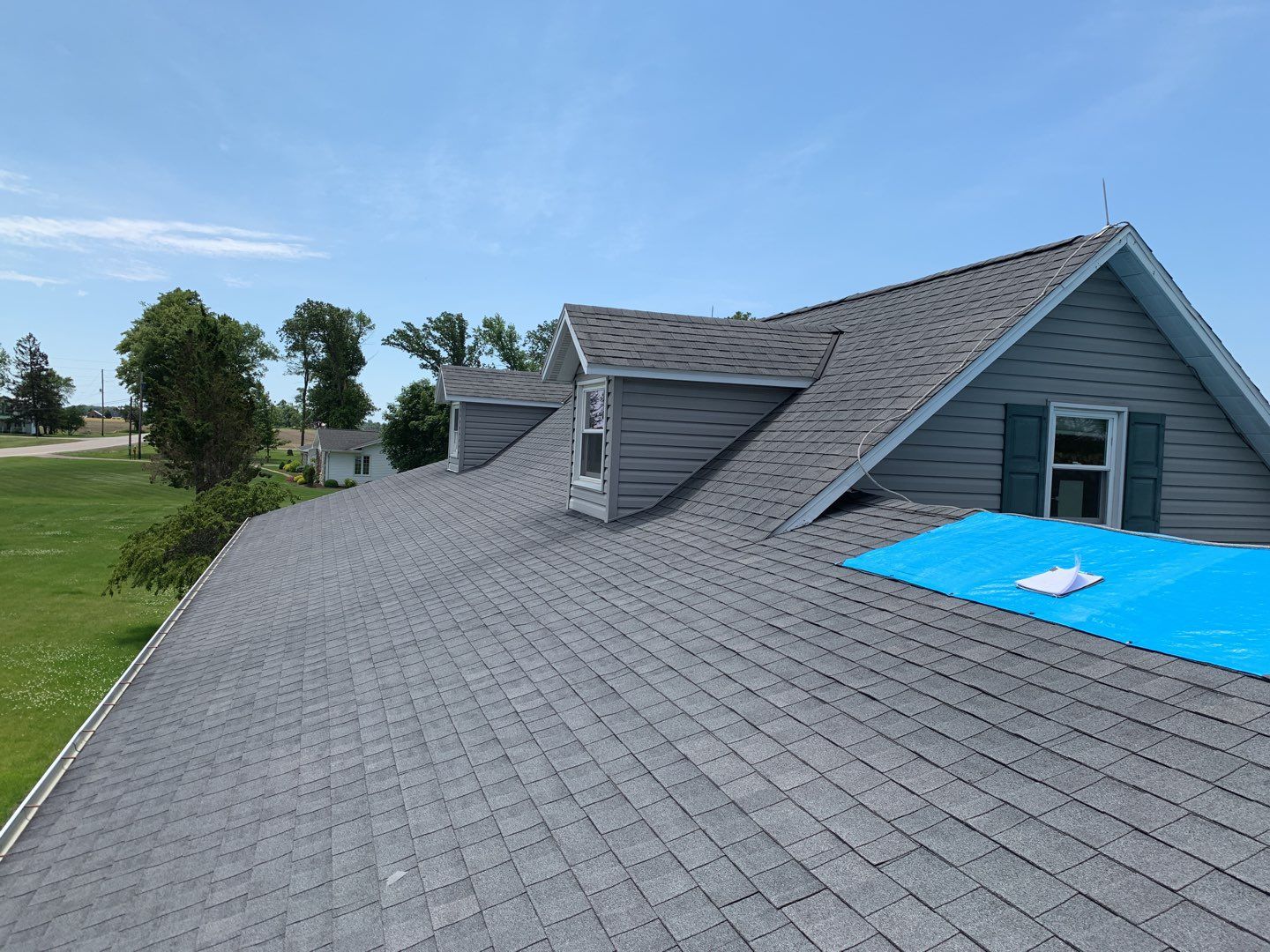 Residential Roofing Installation using Exposed Fastener Metal Roof by 4Ever Metal Roofing