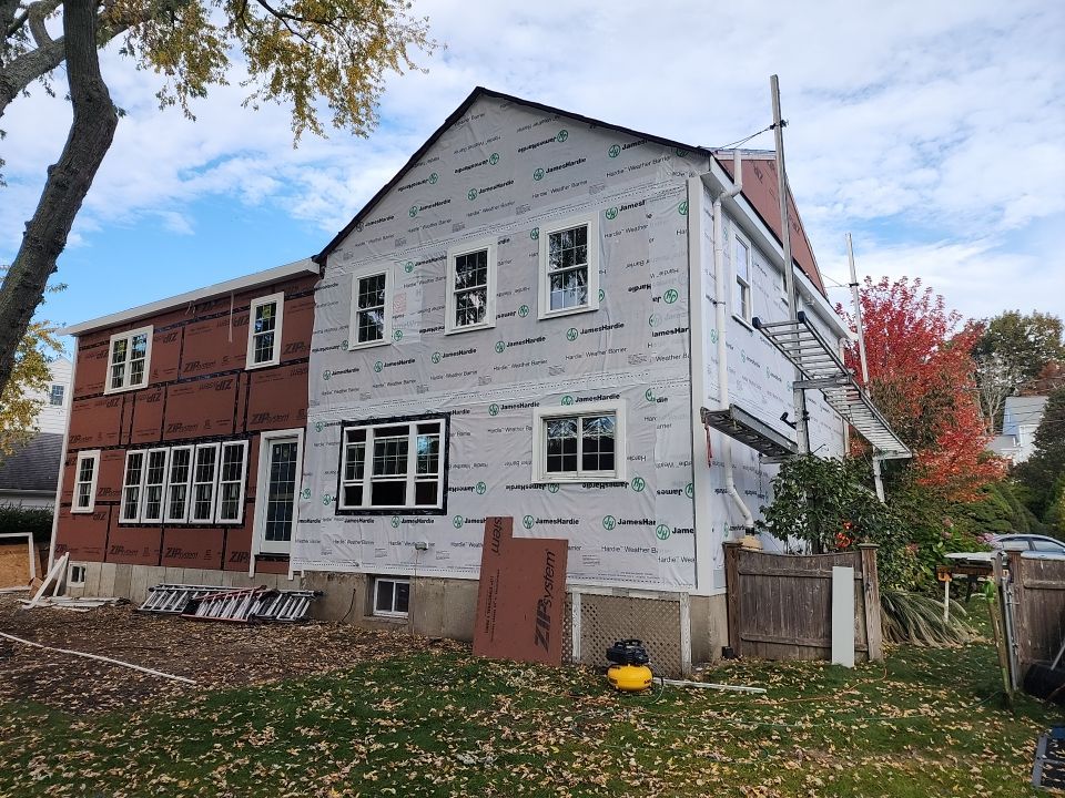 Siding and Roof for house with new addition in Milton, MA by UBrothers Construction