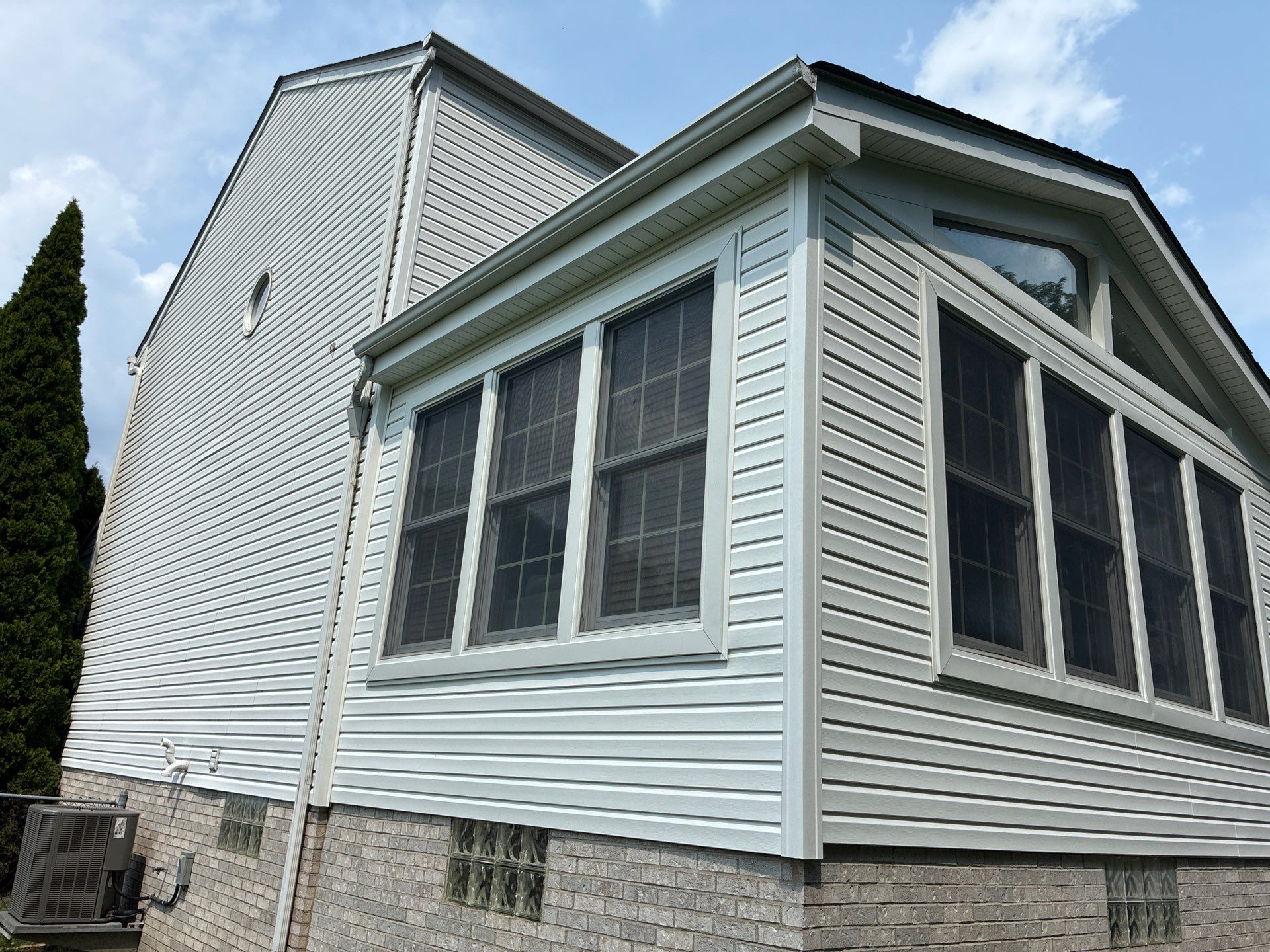 Partial House Vinyl Siding Replacement and Sunroom Renovation near Crafton by Ideal Siding Pittsburgh