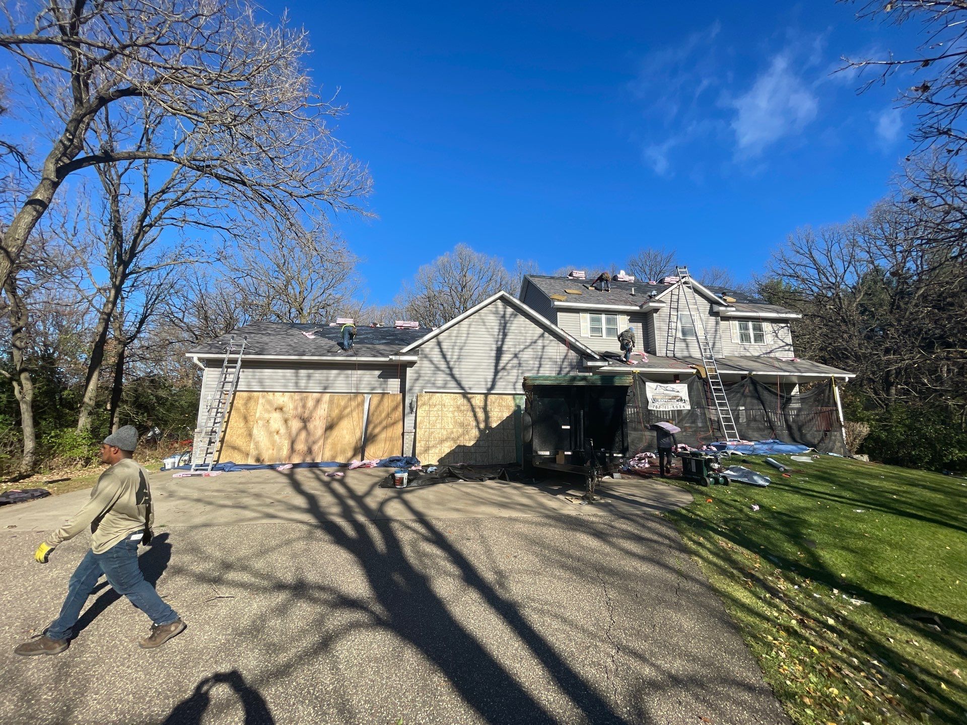 Roof & Siding Replacement – Oak Grove, MN | Insurance-Approved | Owens Corning Duration Midnight Plum & Mastic Carvedwood Harbor Grey by First Impressions Exteriors