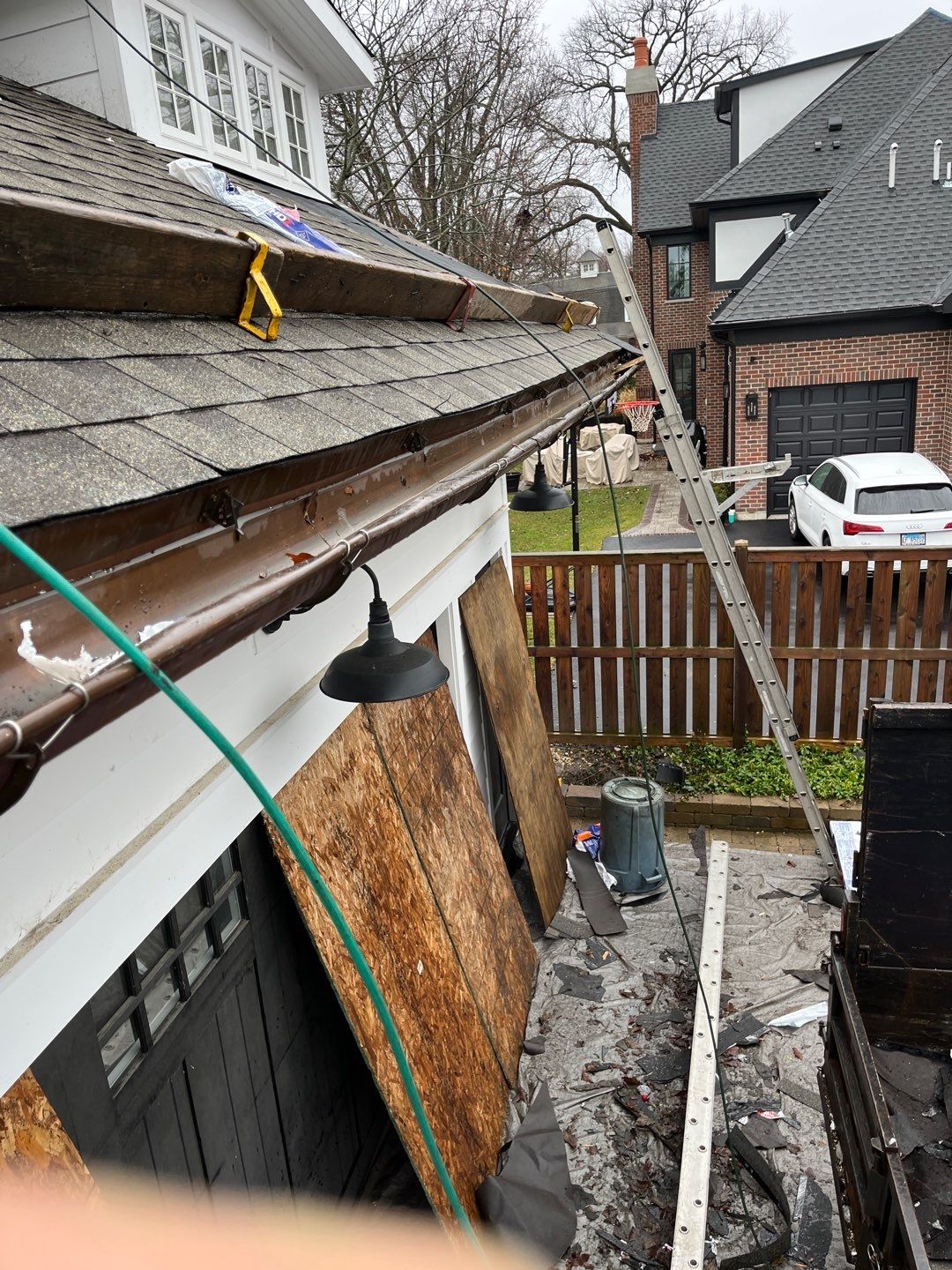 Asphalt Roof Replacement with Half Round Copper Gutter Installment by Custom Installations