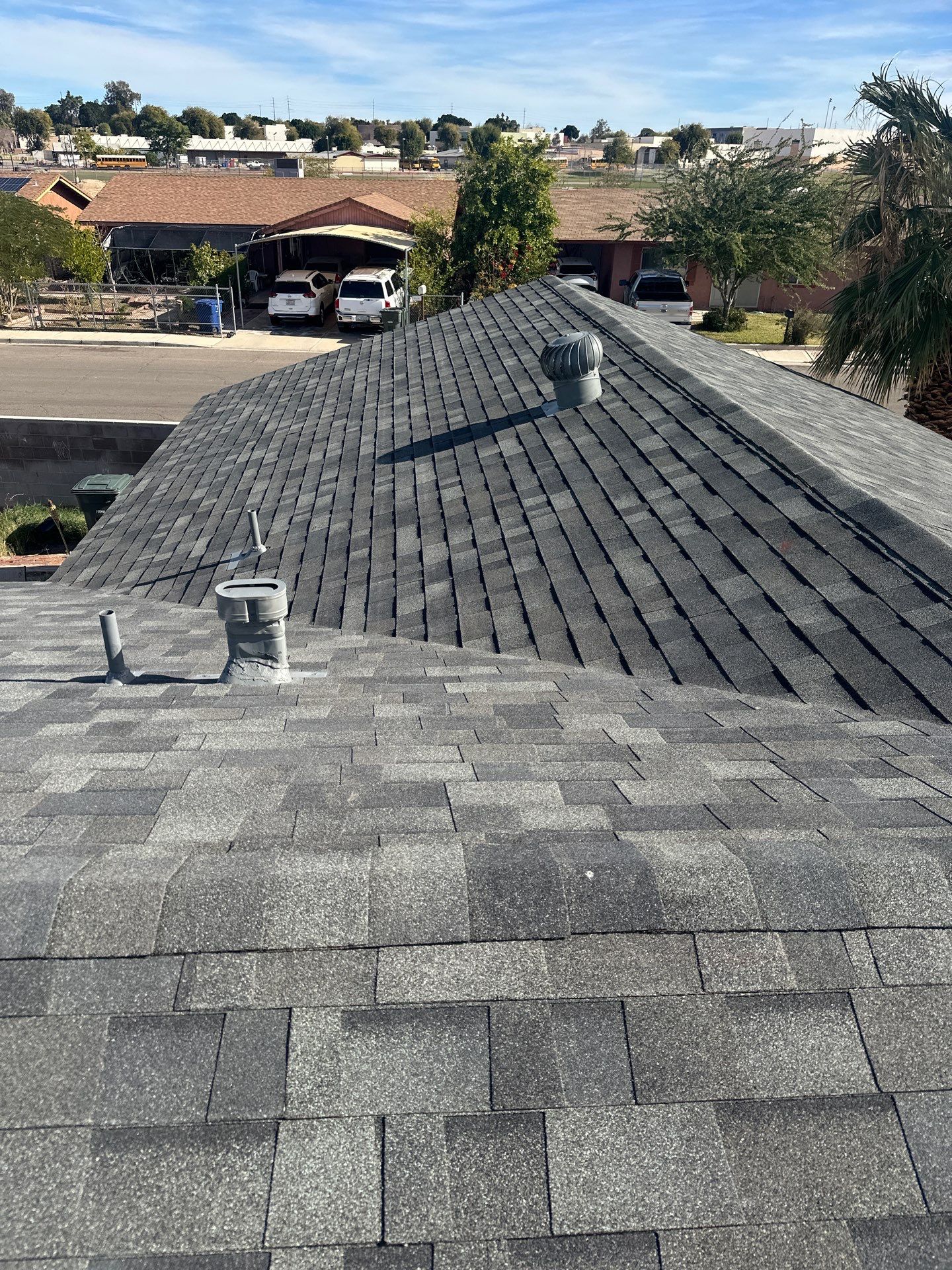 Estate Gray Shingles by Reimagine Roofing