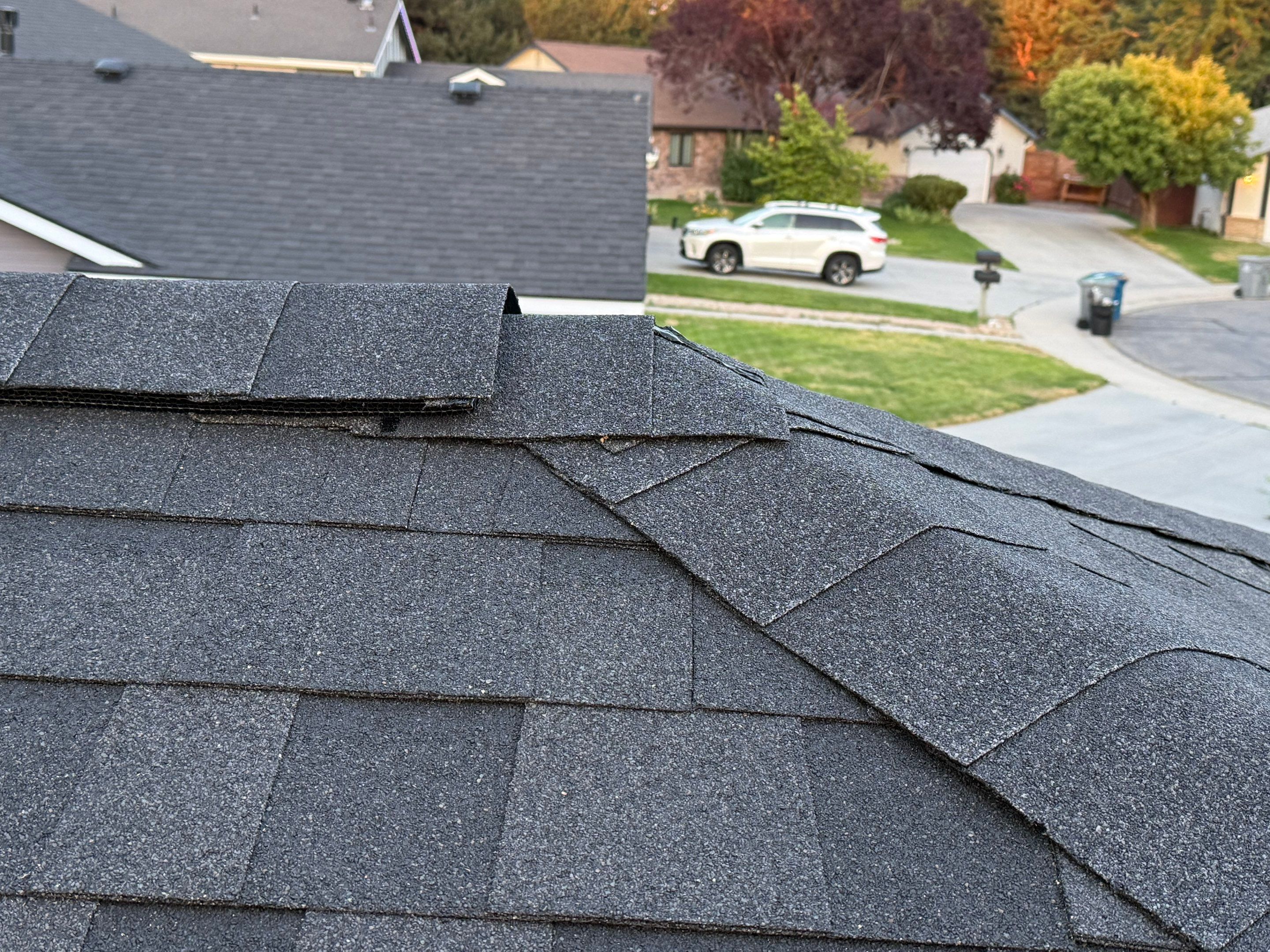 Residential Roof Replacement and Seamless Gutter Installation in Boise by Olive Roofing