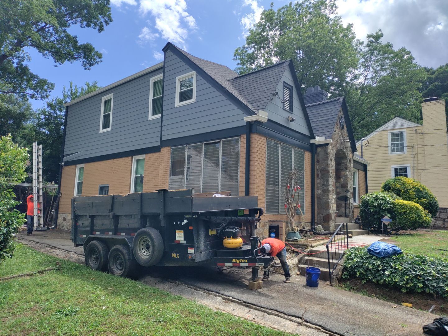 Residential Roof Replacement using Owens Corning Trudef Twilight Black by Inspector Roofing and Restoration