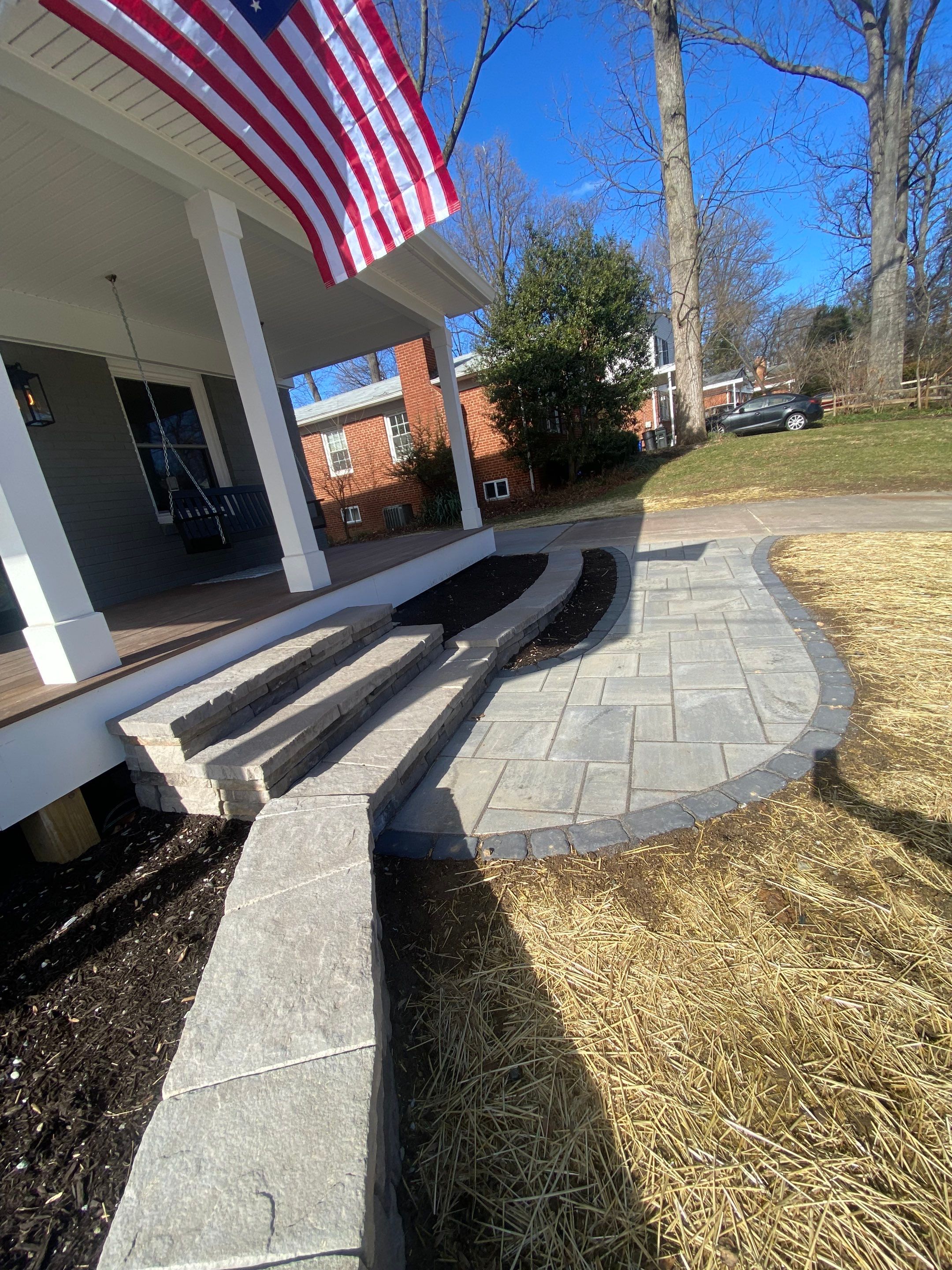 Retaining wall, walkway, small patio and landscape install by The Smet Companies, LLC