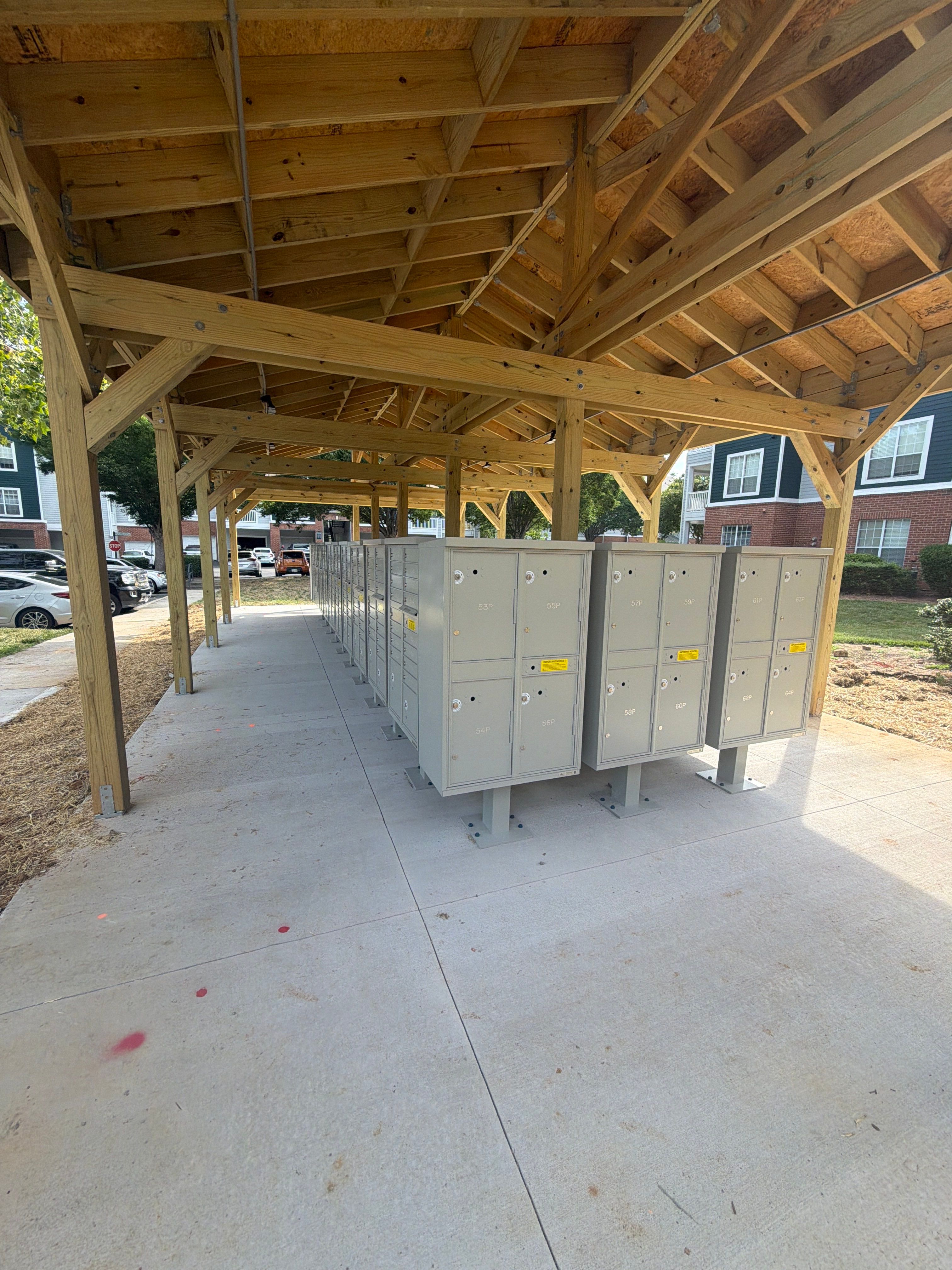 Custom Timber Frame Pavilion for Cluster Mailbox Units in Raleigh by Billy Weatherspoon Contractor