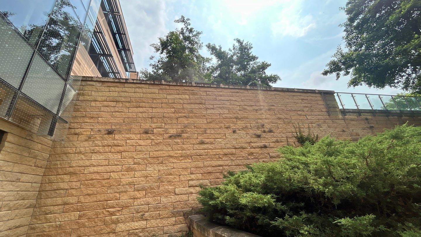 natural stone using Algaecide, soft wash soap by Northern Power Washing LLC.