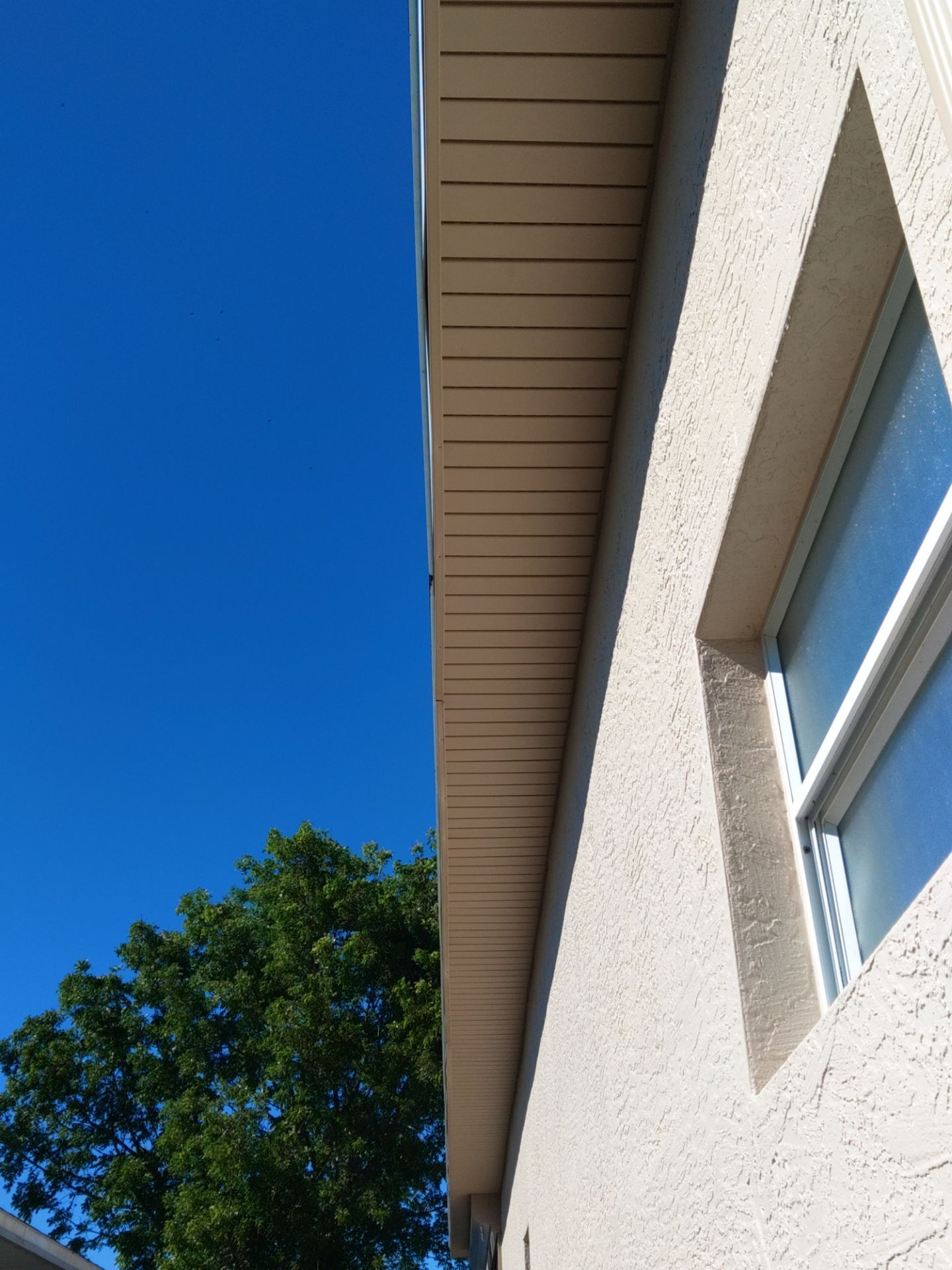 Cameo New Gutters and Soffit Installation FL by Gutter Professors