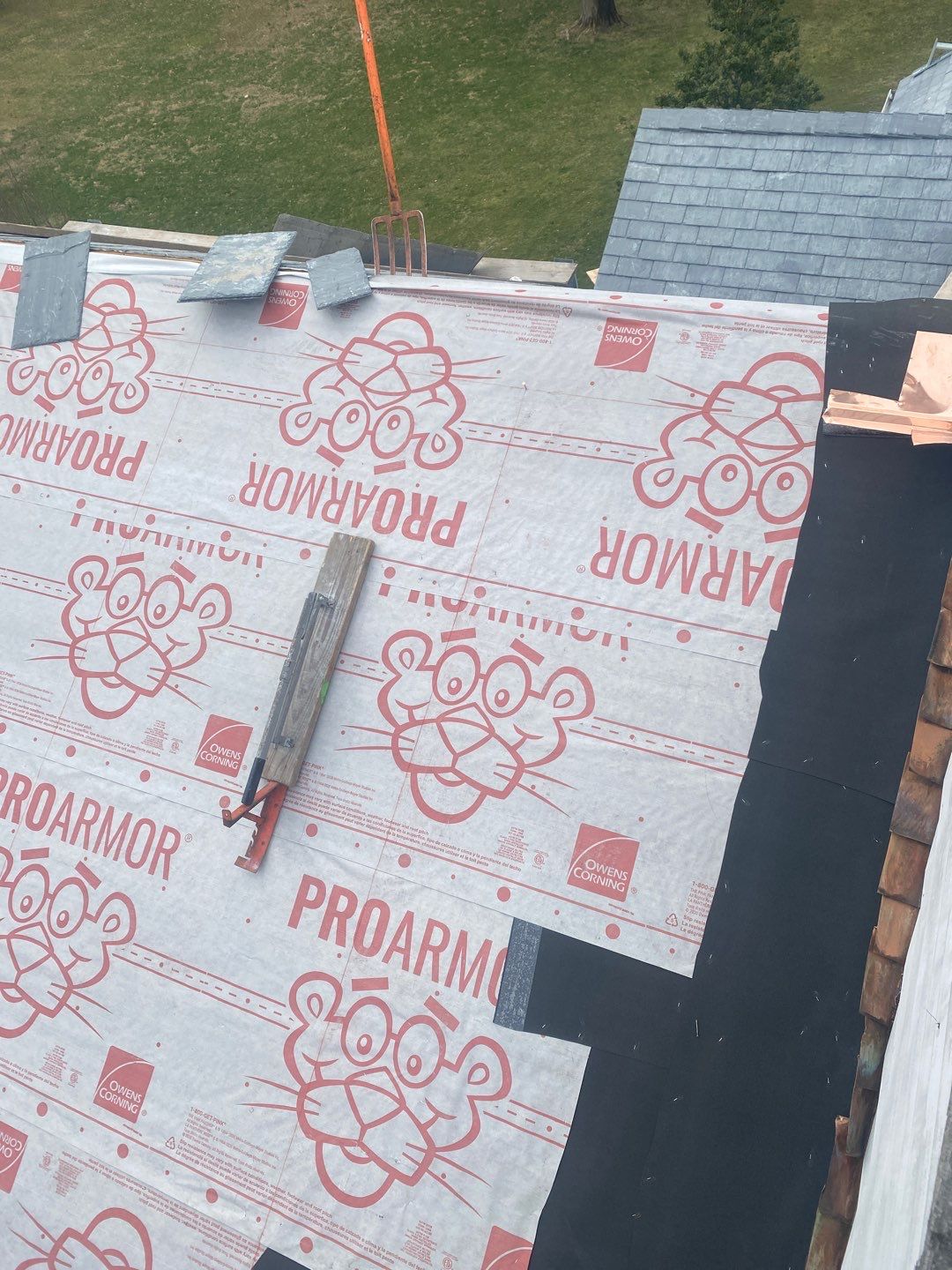 Residential Roofing Installation using Vermont Slate by A Plus Exterior