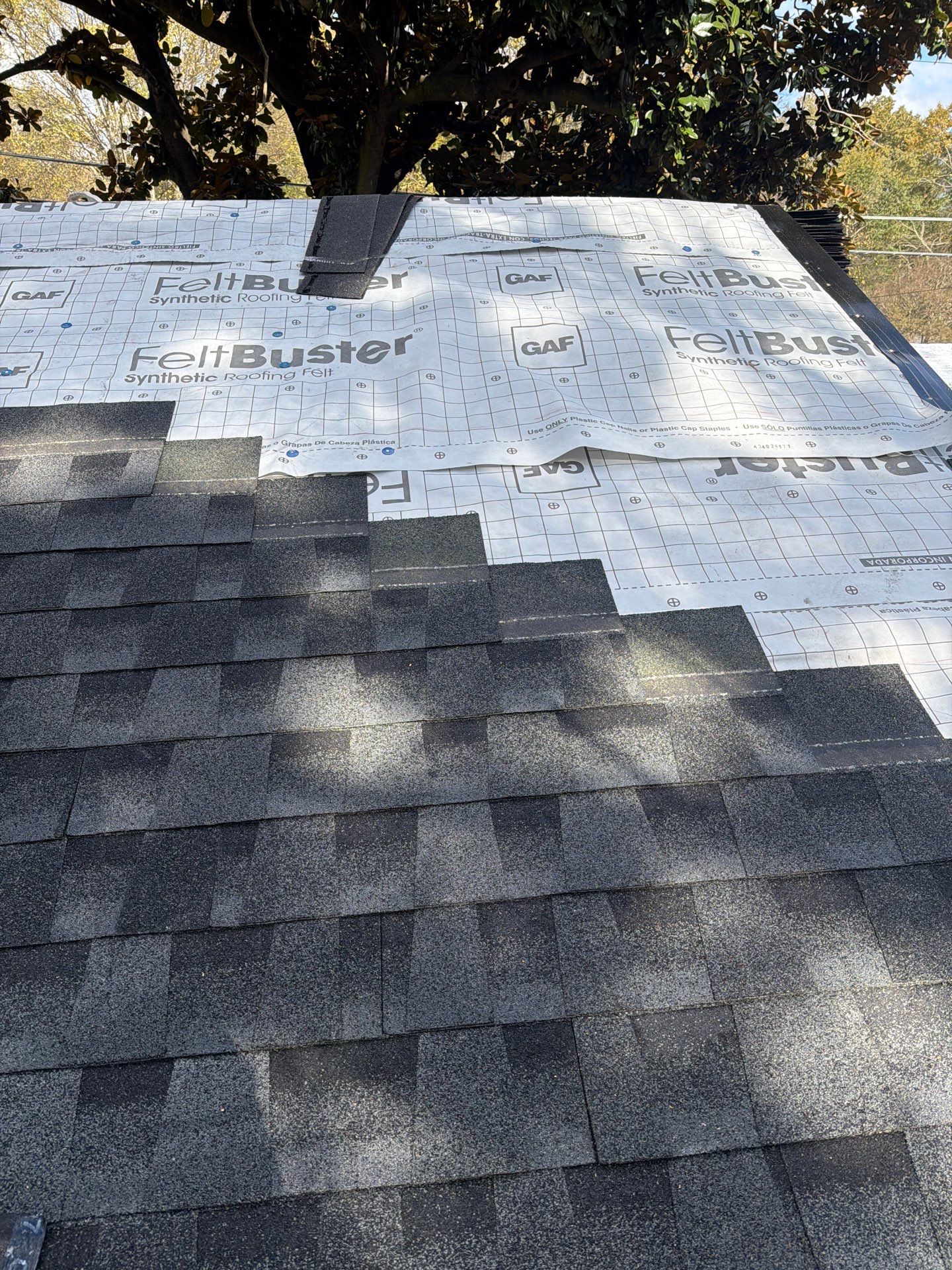 Roof Replacement in Midfield (Charcoal Shingles) by The Roofing Dudes