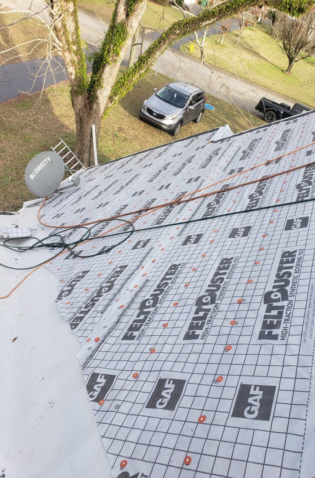 Residential Roofing Installation using Roof Replacement by American Roofing & Construction LLC