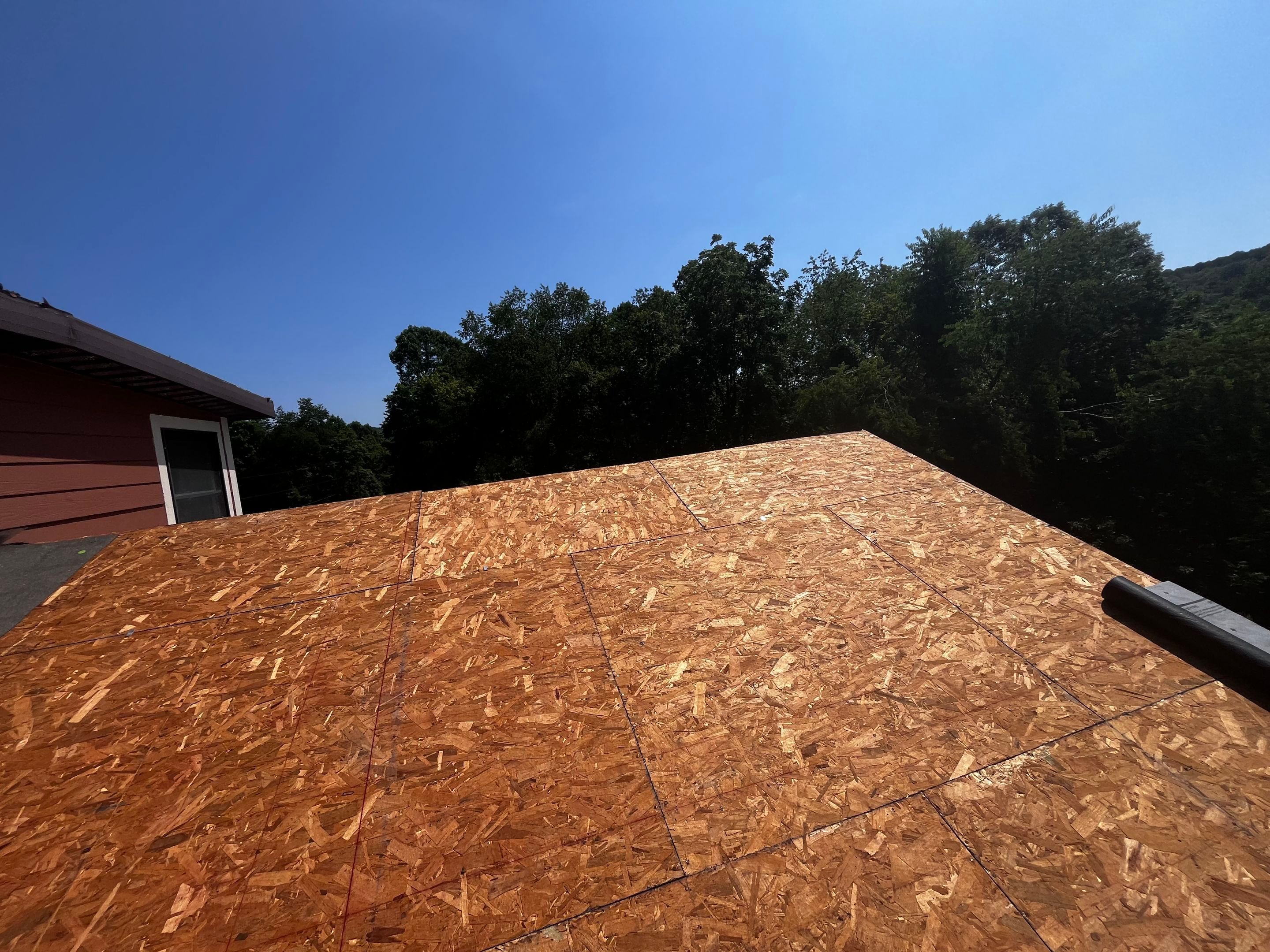 Residential Roofing Installation using GAF TImberline HDZ Hickory by Rainstoppers Roofing