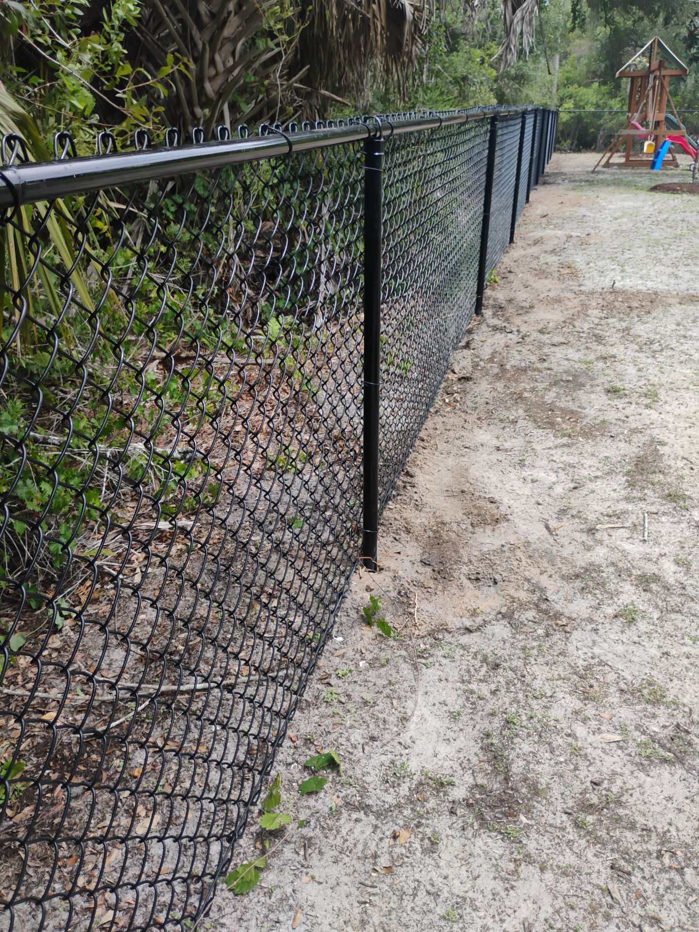 Residential Black Chain-Link Fence Installation in North Port by True Fence LLC