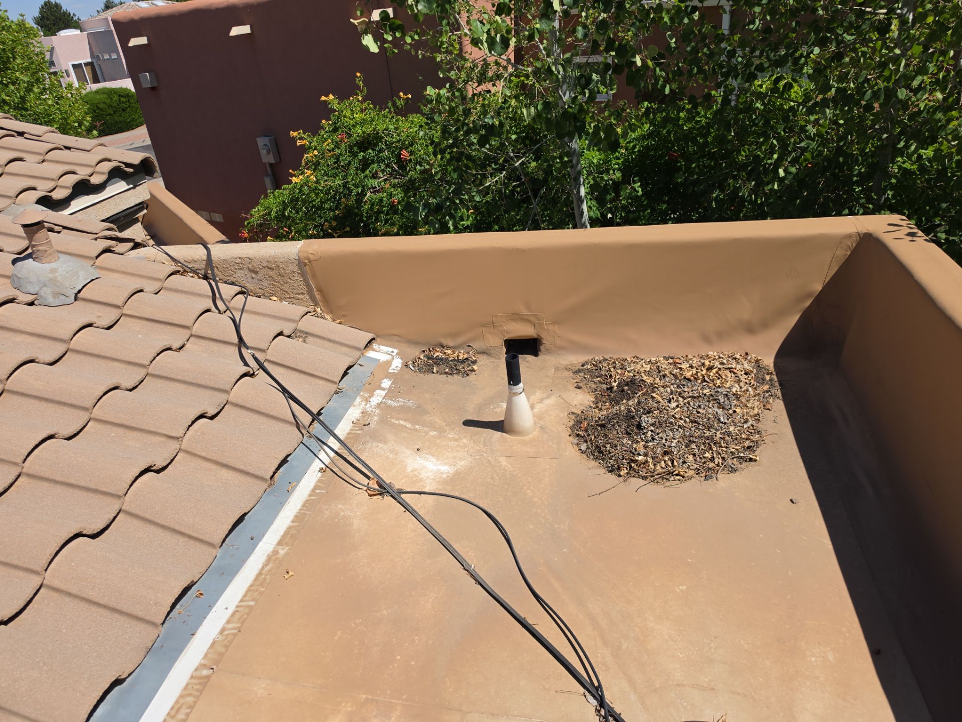 Tile and TPO Roof Maintenance and Gutter Cleaning in Sandia Heights by Doyle Roof Masters Inc